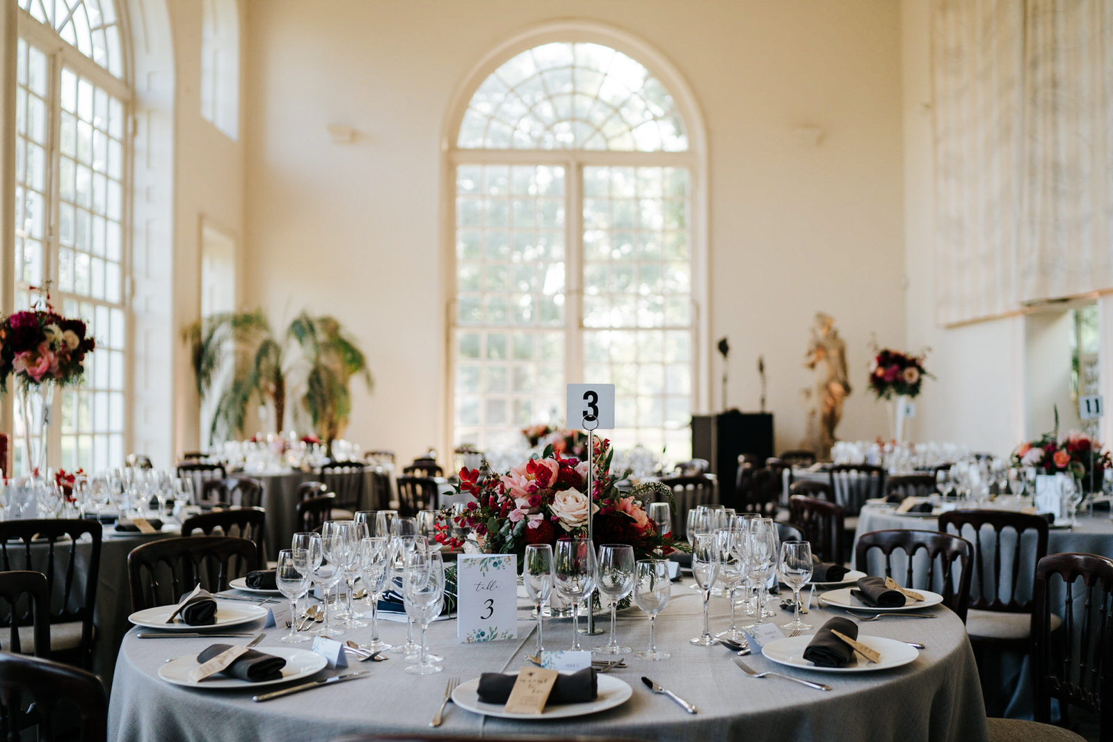  Wide shot of table setup for wedding breakfast at the orangery in kew gardens 