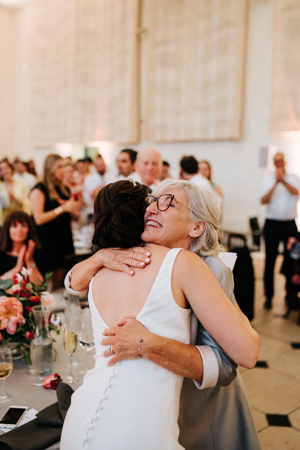  Bride hugs her mother as her speech finished 