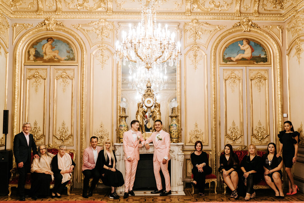  Posed, Downton Abbey-esque family photograph in golden and grand ceremony room in Paris 