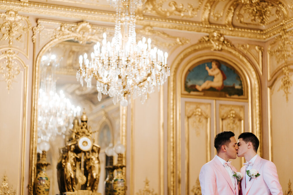  Grooms kiss inside stunning royal room in Paris courthouse at same sex wedding 