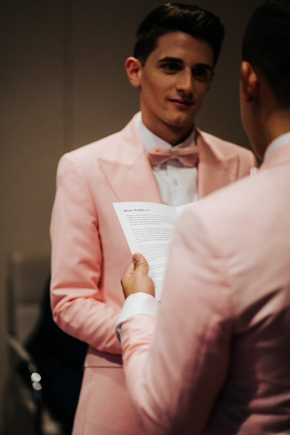  One of the grooms starts reading his personalised wedding vows during same sex ceremony in Paris 