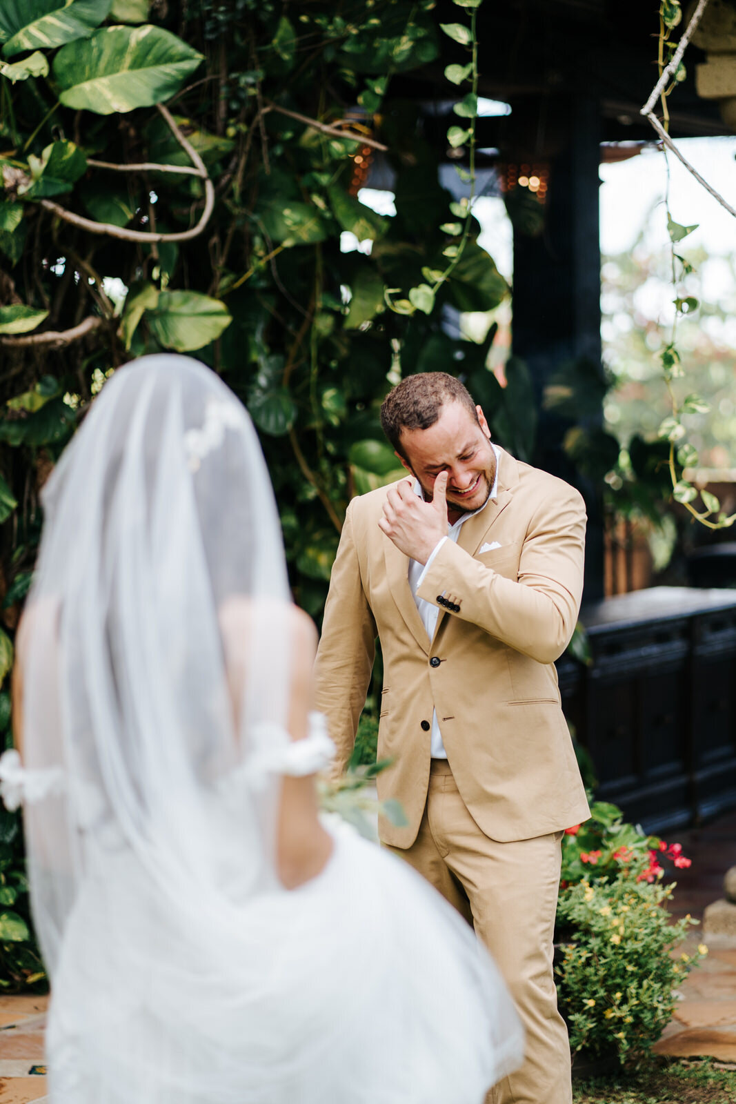 Groom cannot contain his emotions and starts crying as he sees t (Copy)