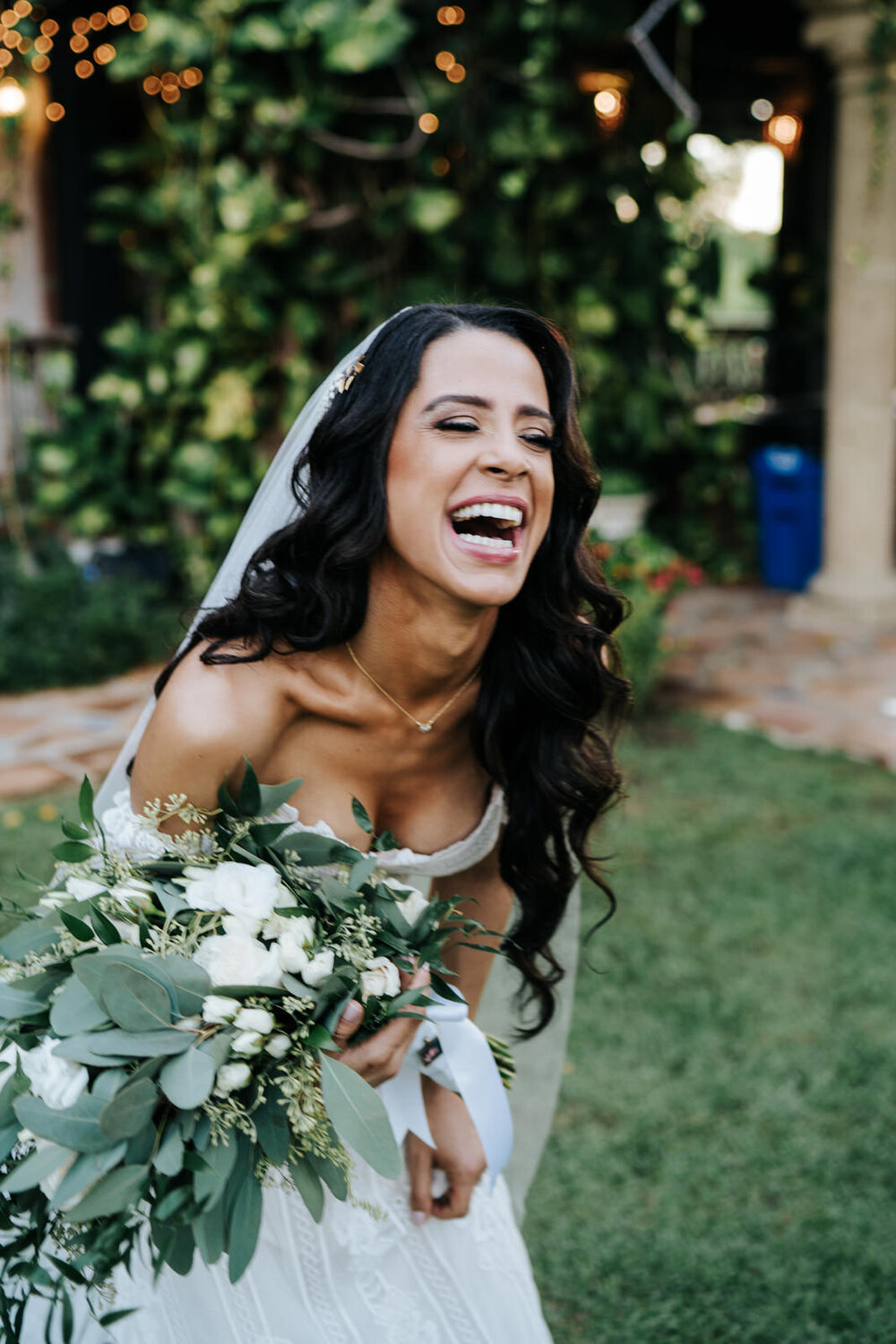 Slightly out of focus photograph of the bride smiling and laughi (Copy)