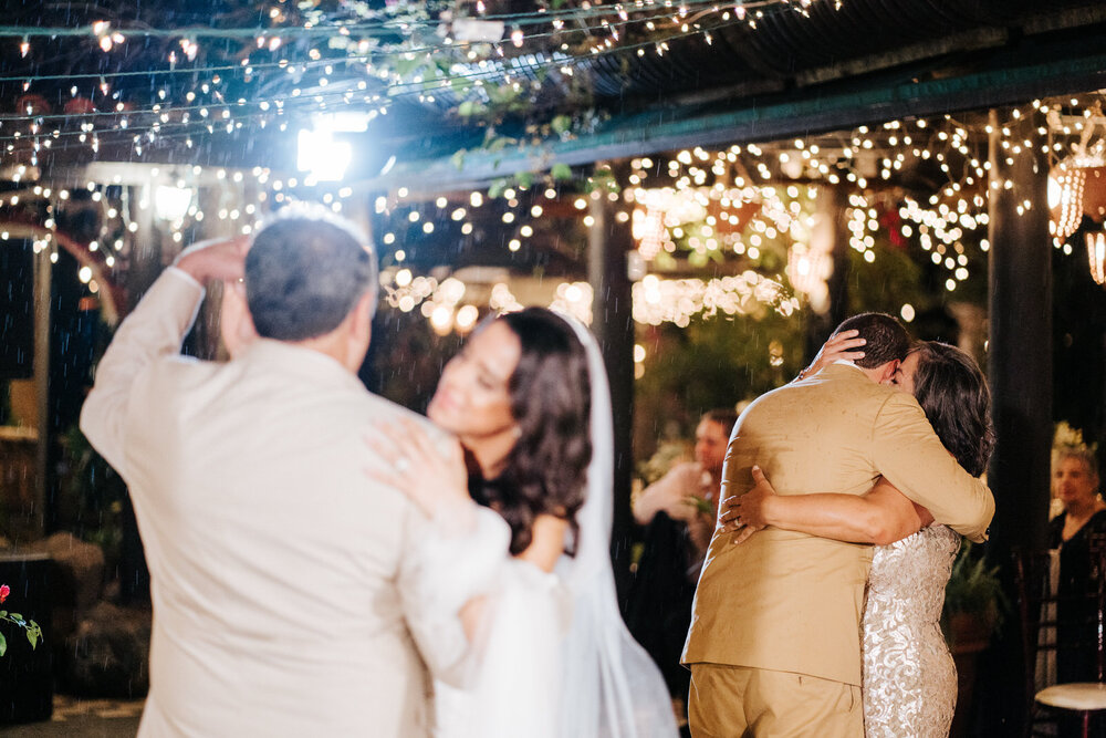 Bride continues dancing with her father as groom and mother of t (Copy)