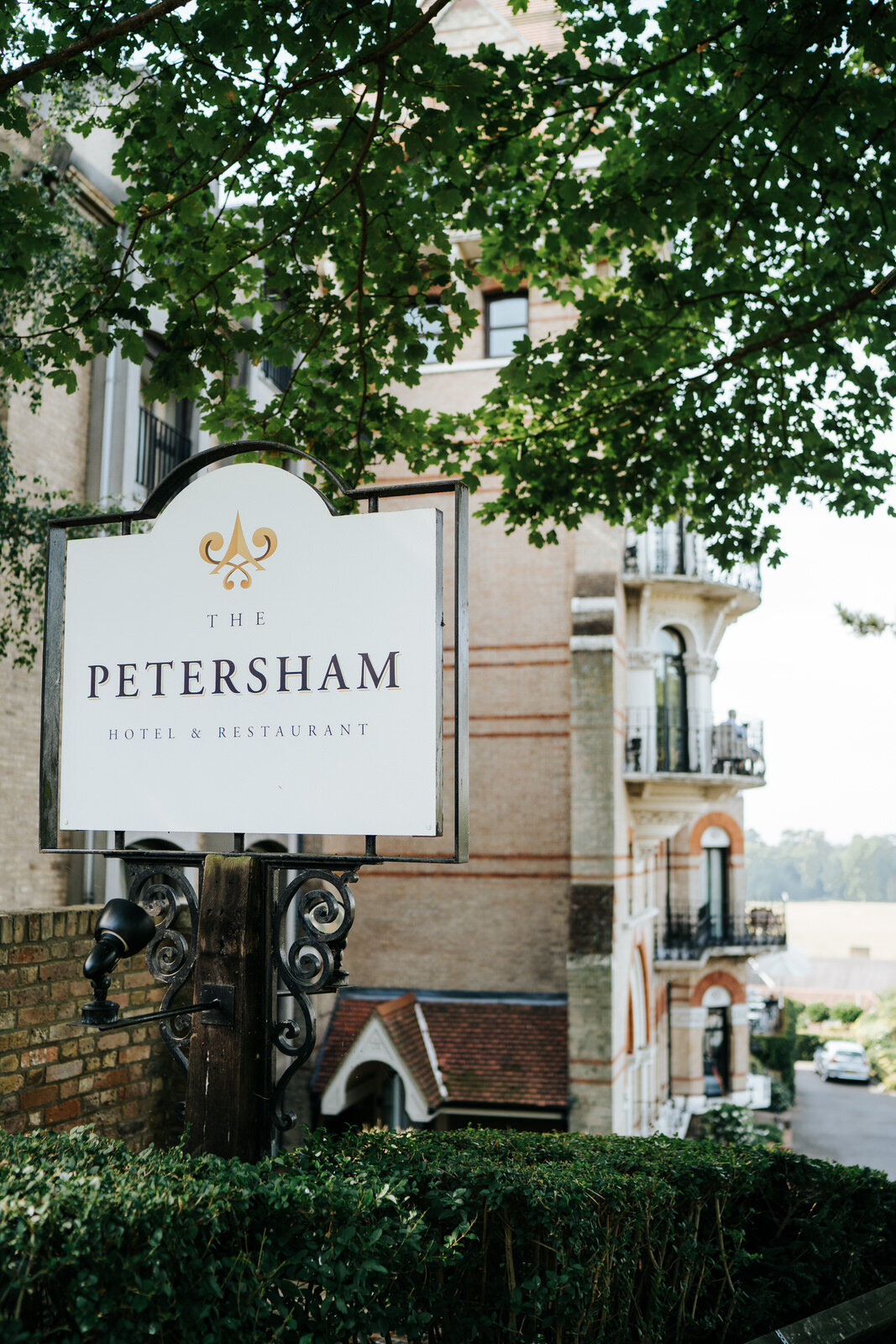 Sign outside The Petersham Hotel in Richmond as bride gets ready for wedding inside