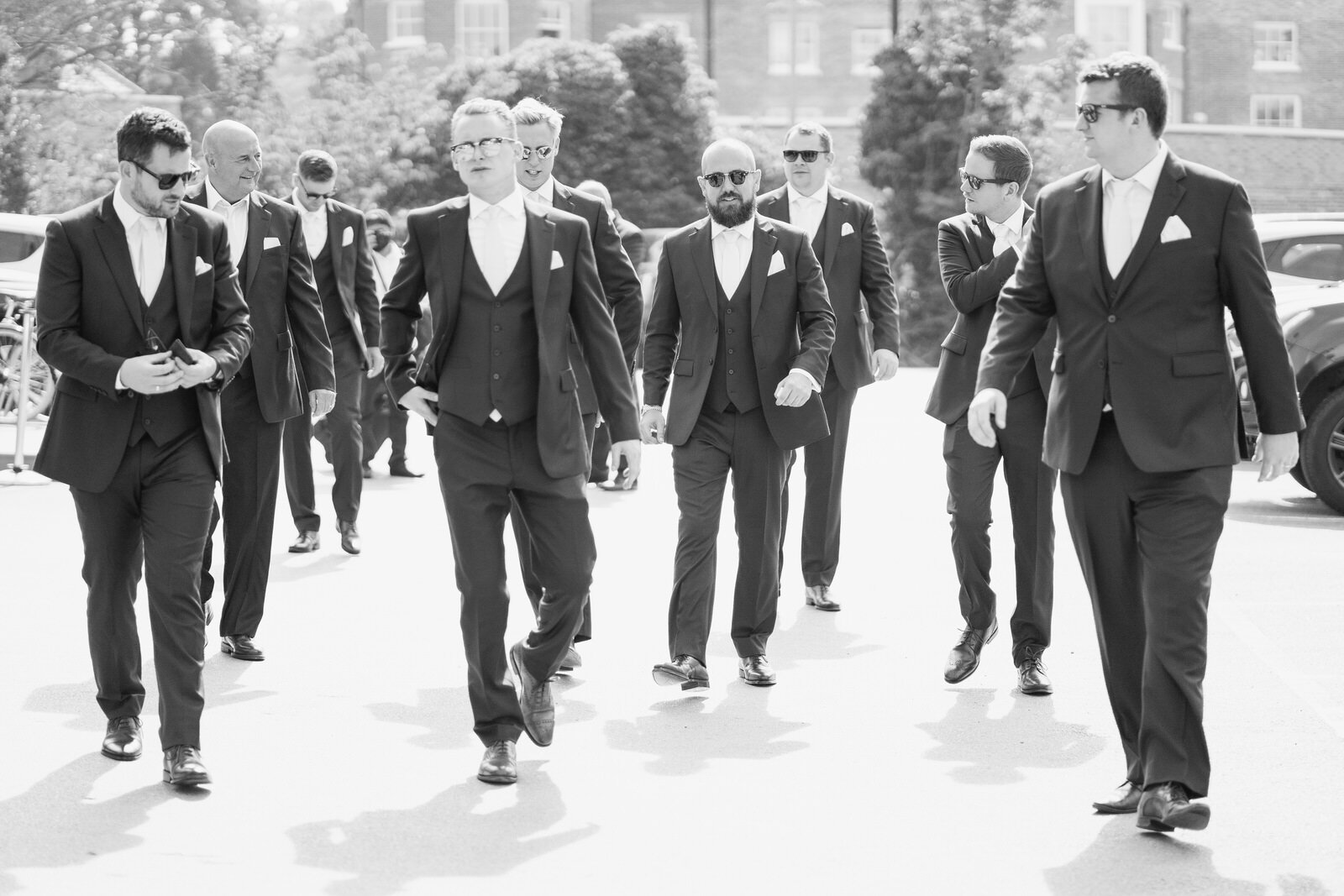Groom and his ushers leave Richmond Harbour Hotel before wedding ceremony at Pembroke Lodge in Richmond