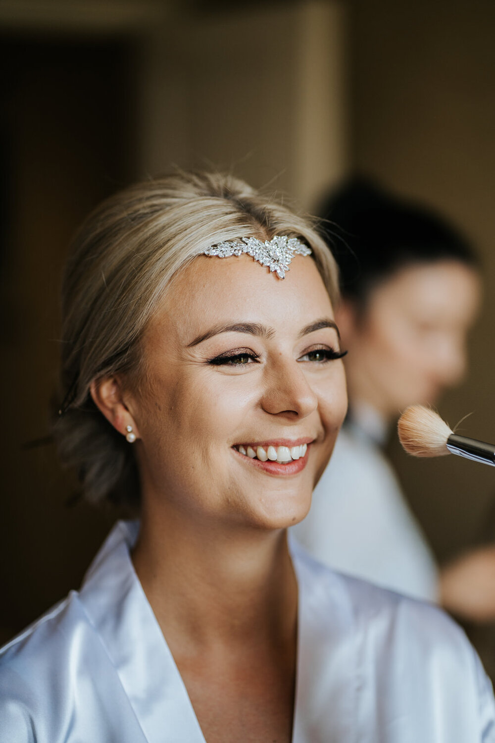 Bride has her make-up done at The Petersham Hotel as she gets ready for wedding in Richmond
