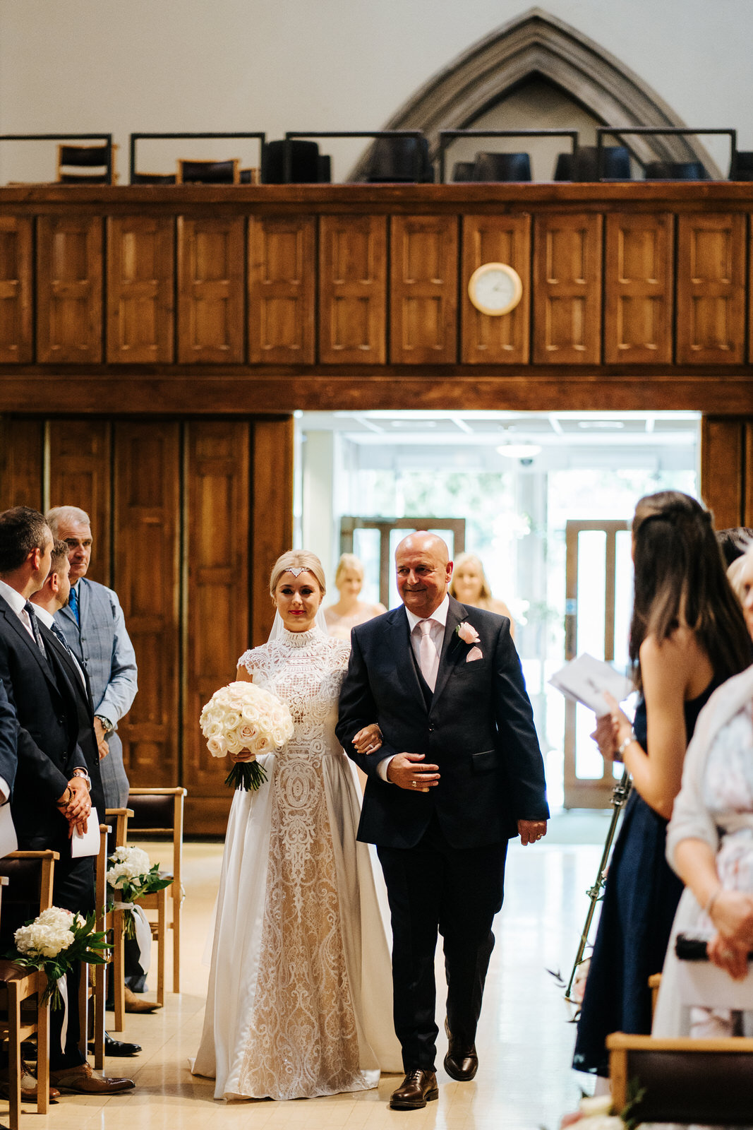 Bride and her dad walk down the aisle at St Matthias Church on Richmond Hill