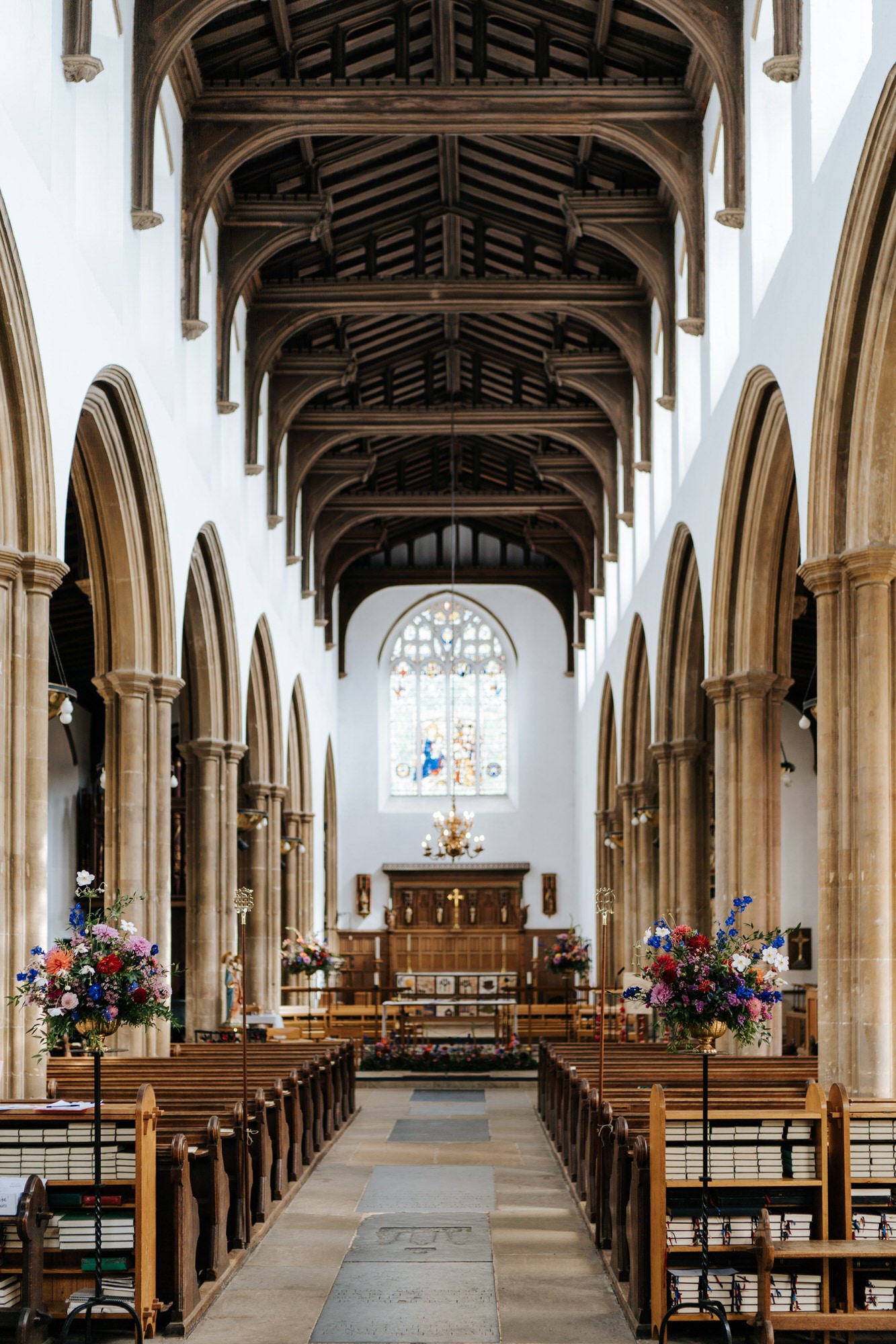 Wide photograph of a decorated church in Woodbridge, empty before guests begin to arrive