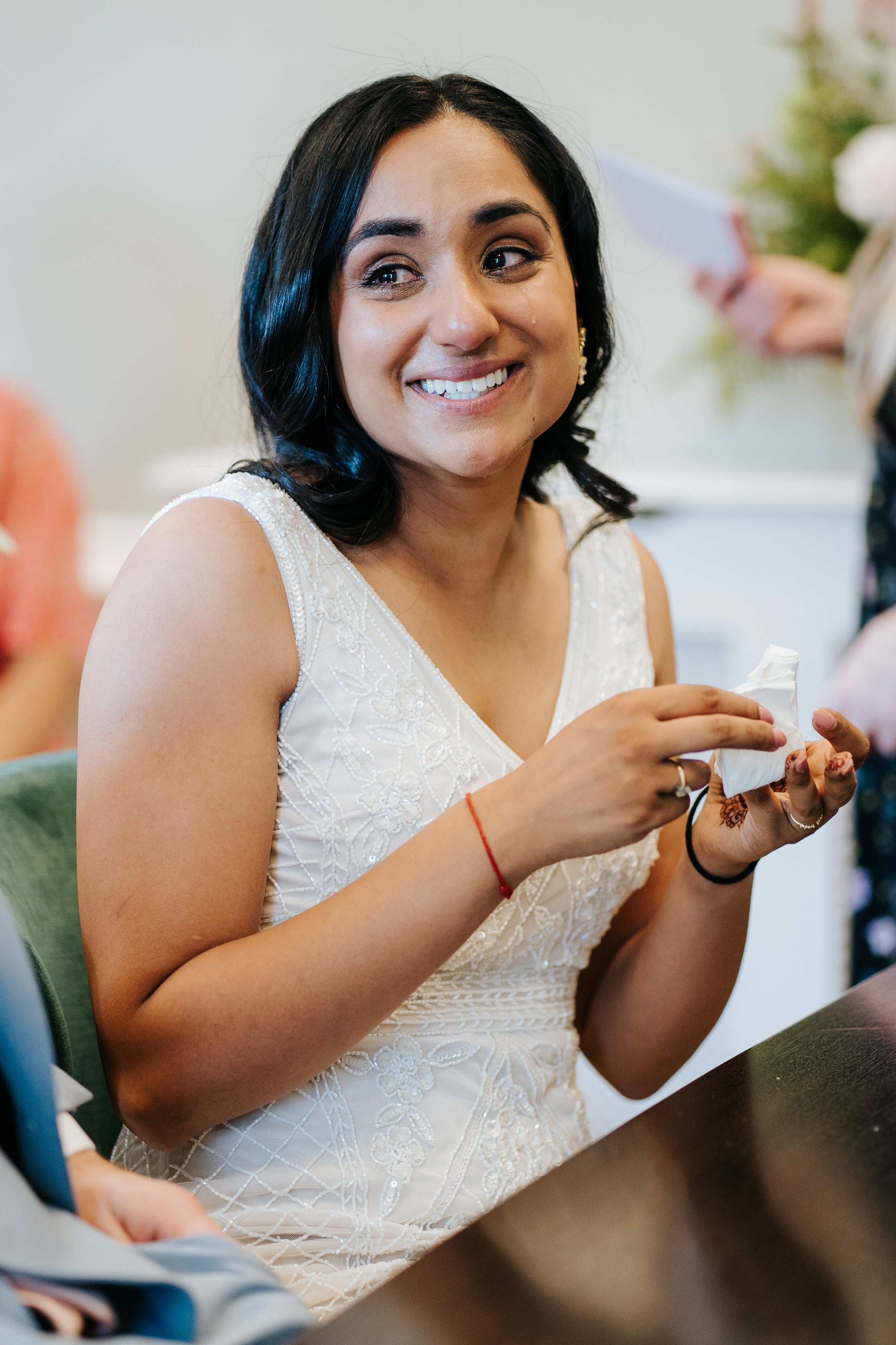 Close-up portrait of bride during ceremony at York House as she has tears of joy streaming down her face