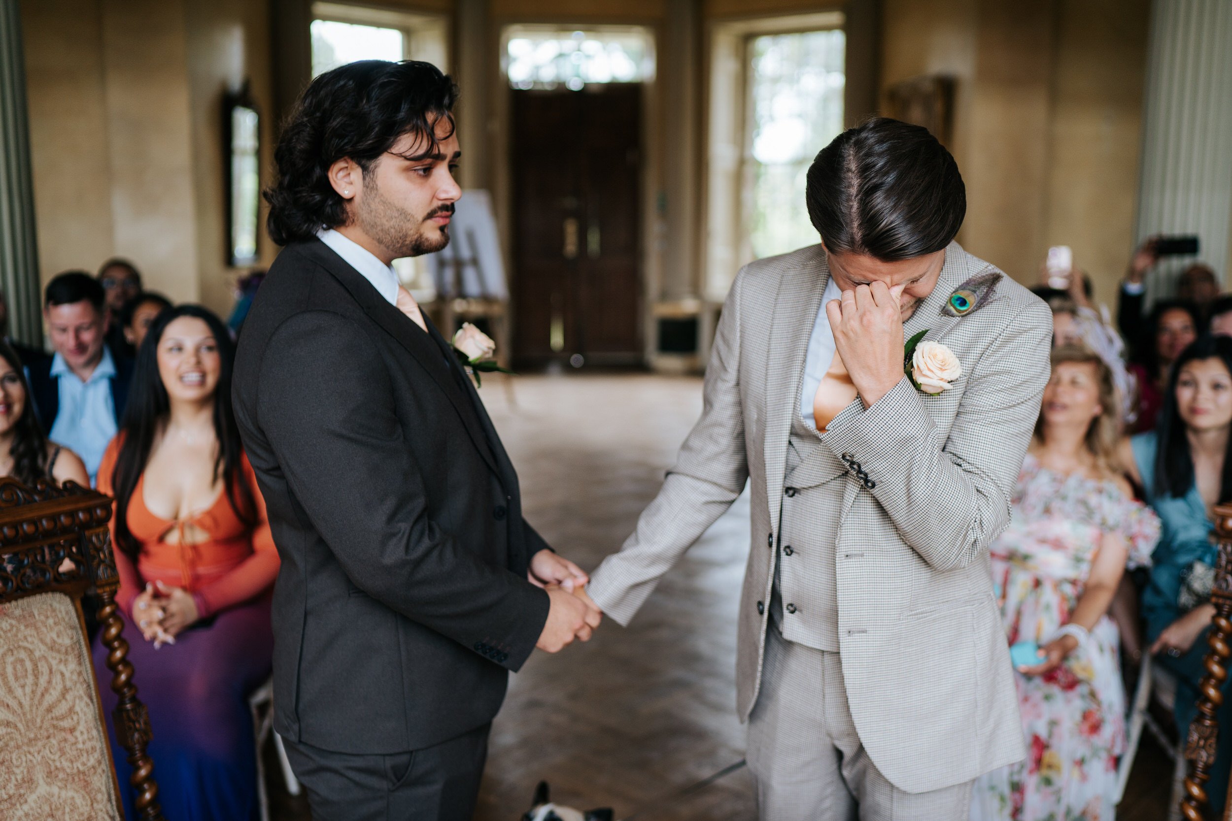 Two grooms are emotional and teary as they get married at Hampton Court House in London