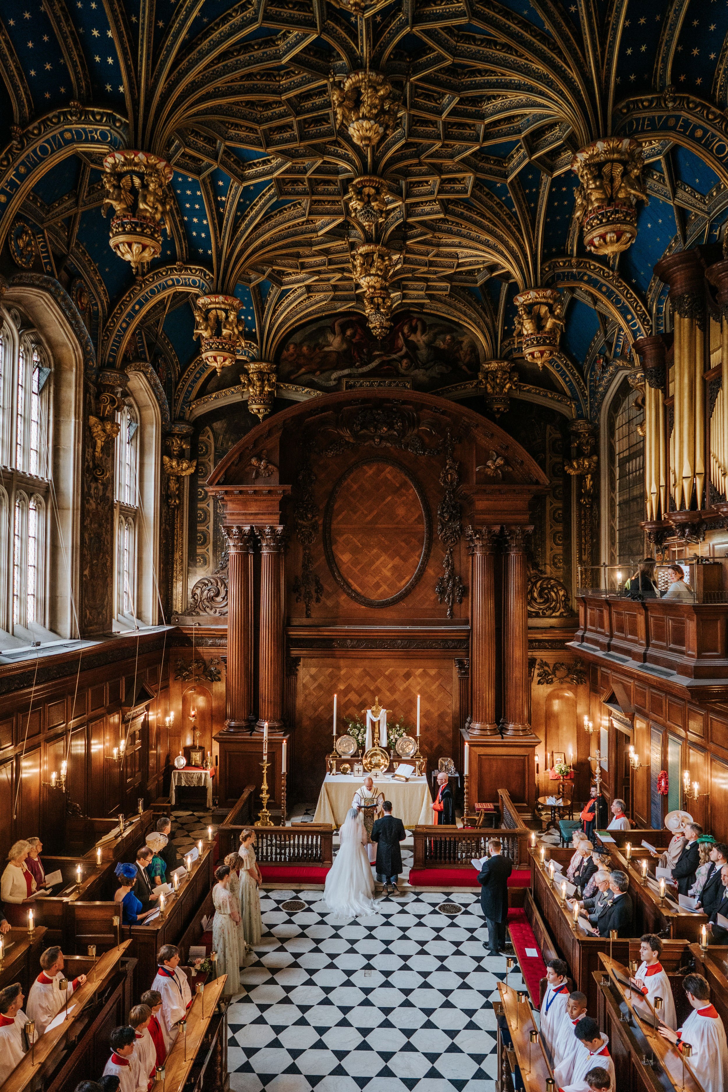Very wide photograph of the Chapel Royal at Hampton Court Palace during wedding blessing