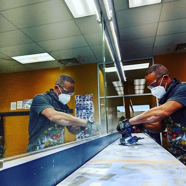 Resurfacing my client's Artwork counters and tables... after 8 years he calls me back to upgrade the whole display. #larrysbarbercollege #refresh #uniquefurniture #southsidechicago #blackownedbusiness #artdesign
