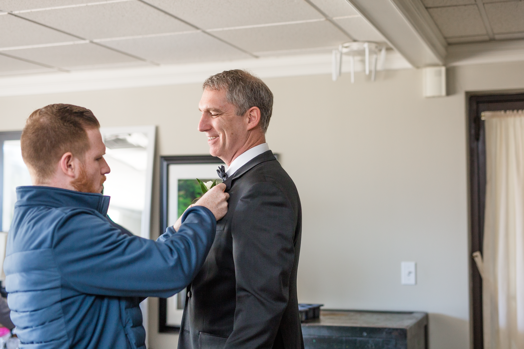  Helping the FOB with his boutonnière! Nick has pretty much perfected his "pinning" skills by now! 