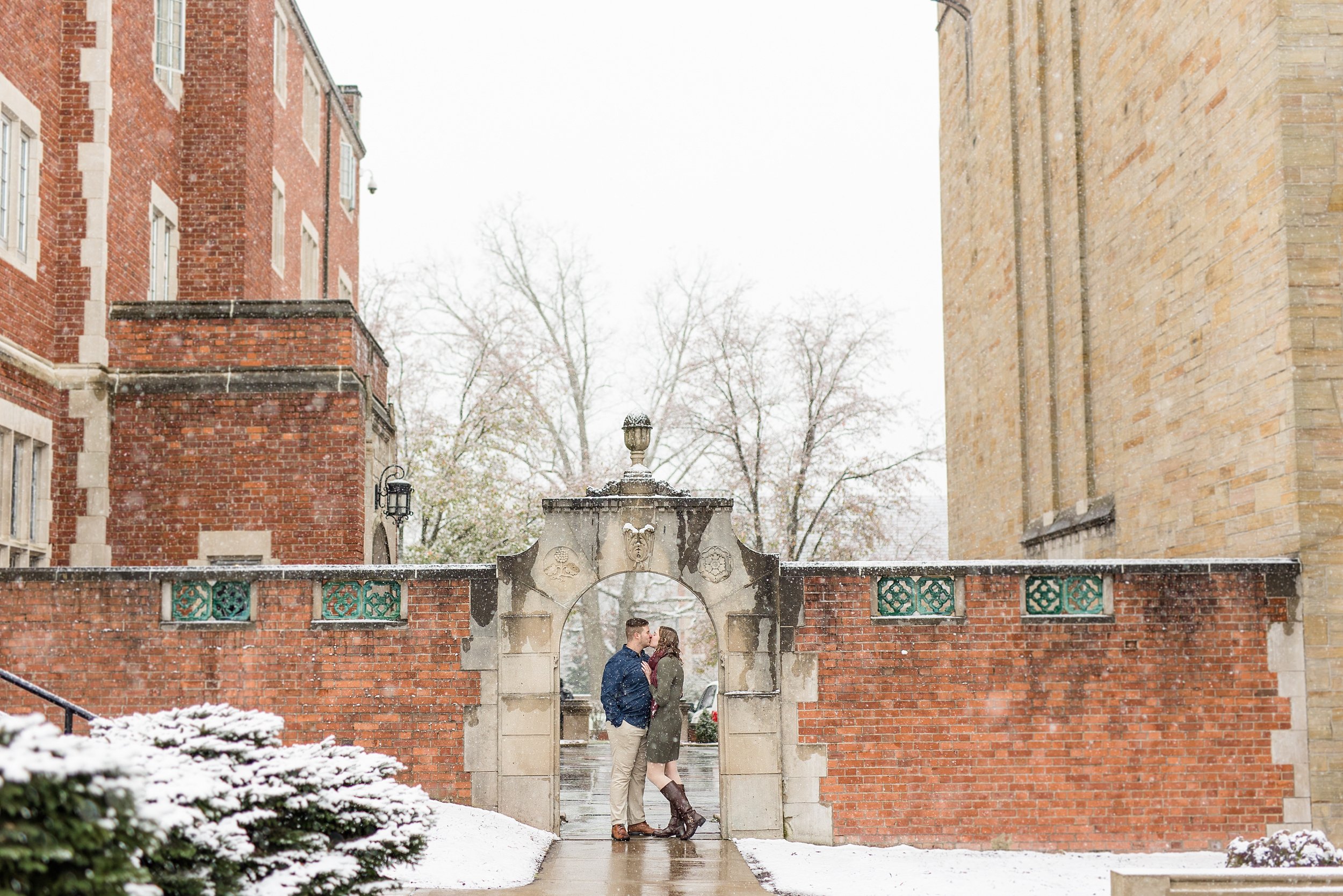  Engagement photos in a (somewhat surprise) snow storm! We knew it was going to snow, but I don’t think any of us knew how heavy that snow would be. Thankfully - these two went for it! And thankfully I had a willing husband to hold an umbrella over m