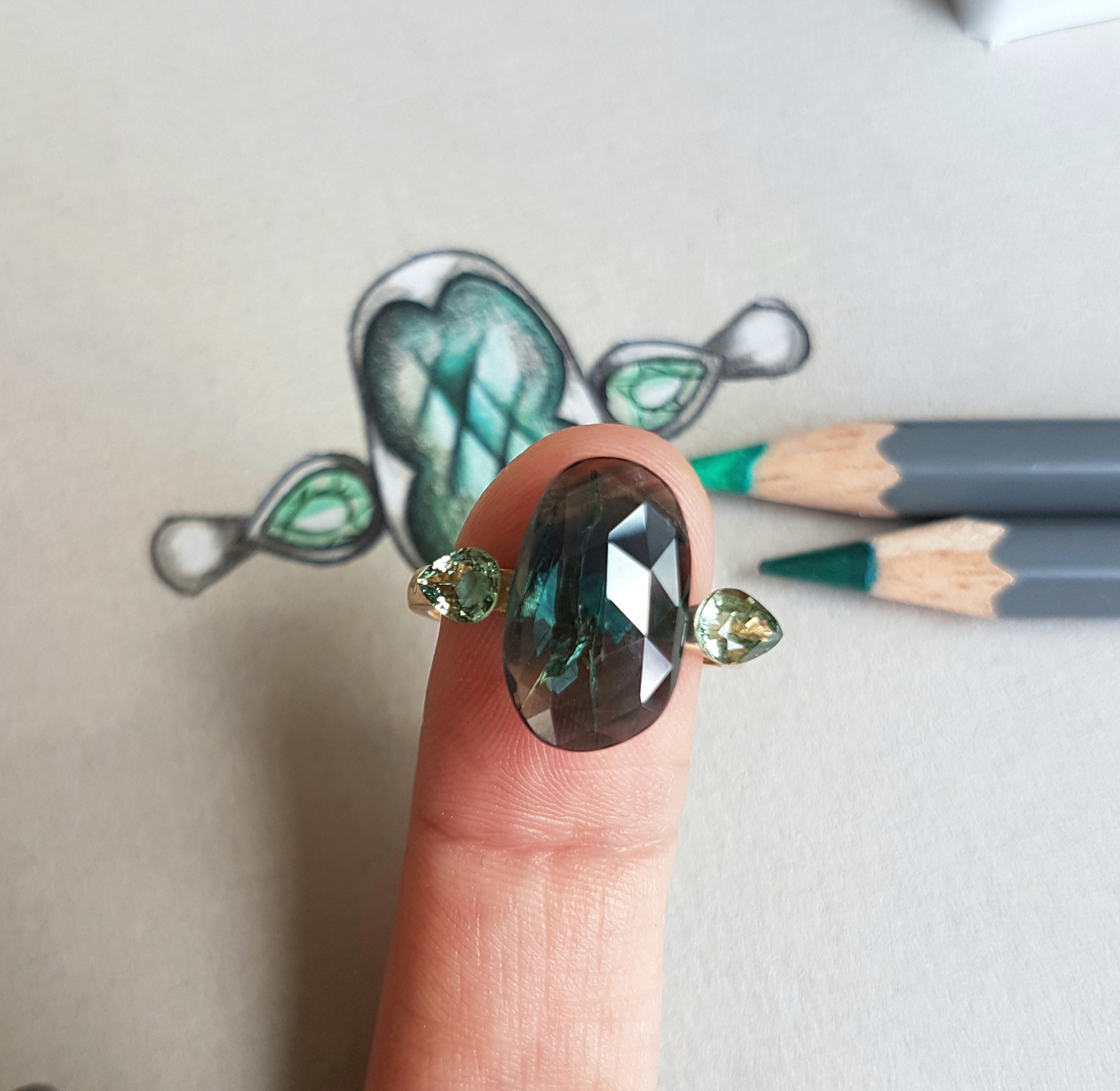 Rose cut petrol tone sapphire ring