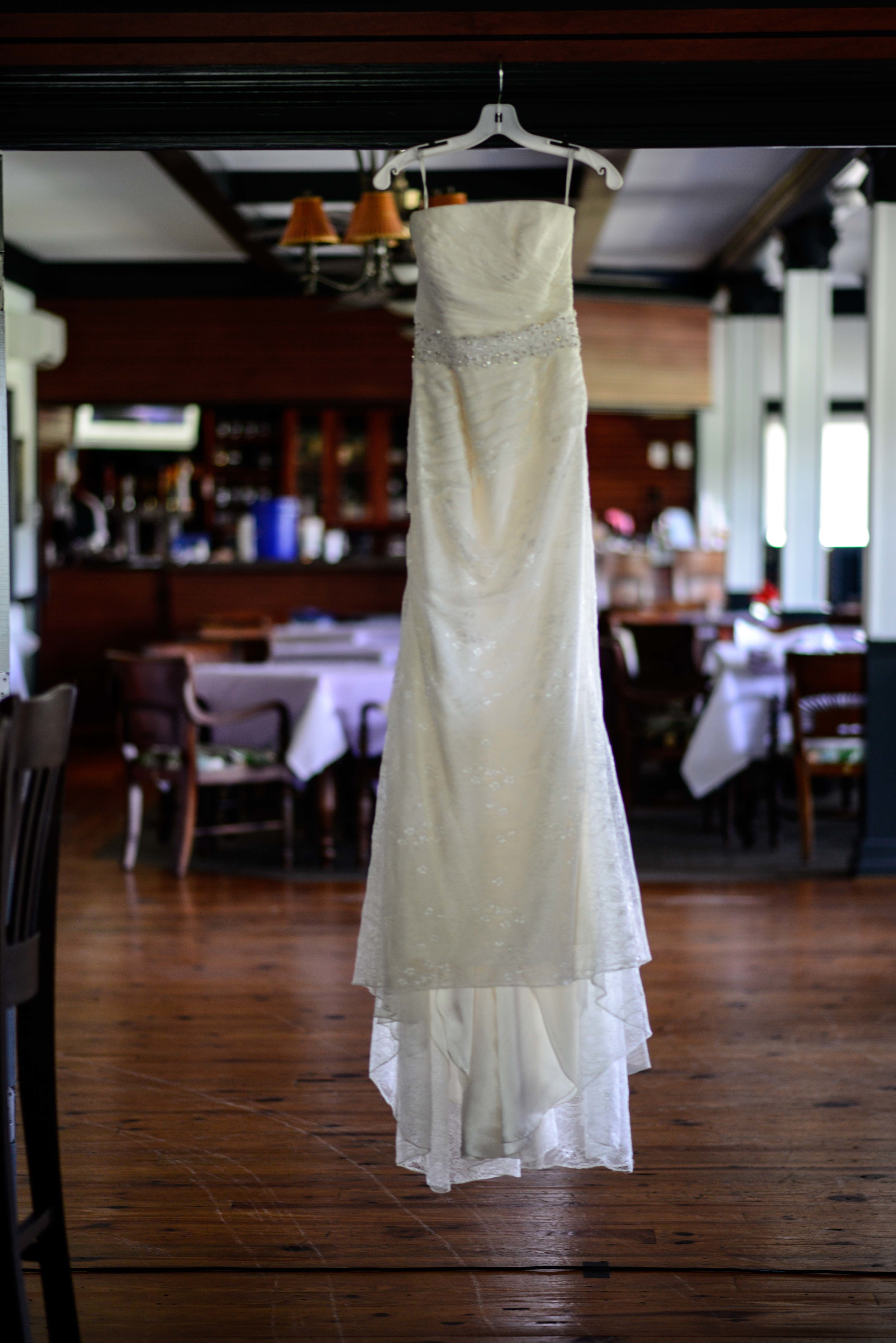 Vera Wang Lace wedding gown with ornate beaded belt.
