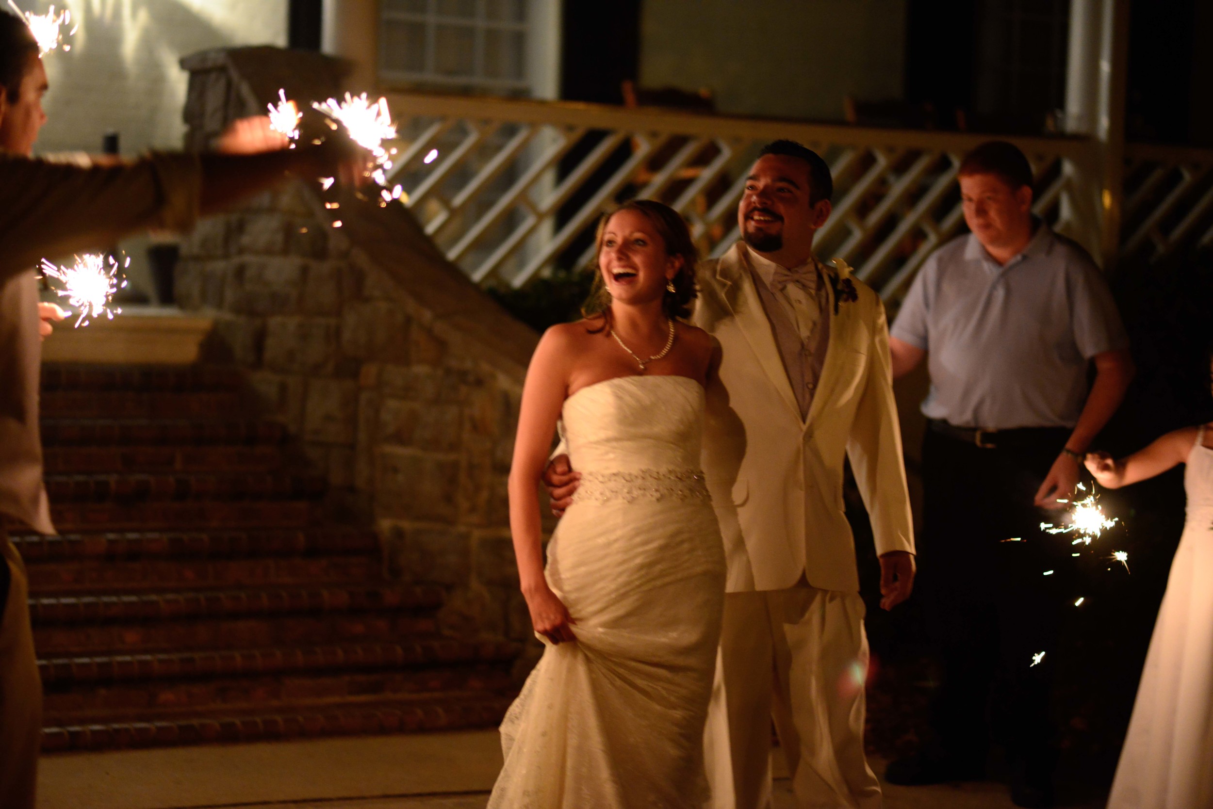 Sarah and Erich share their excitement at the sparkler send off.