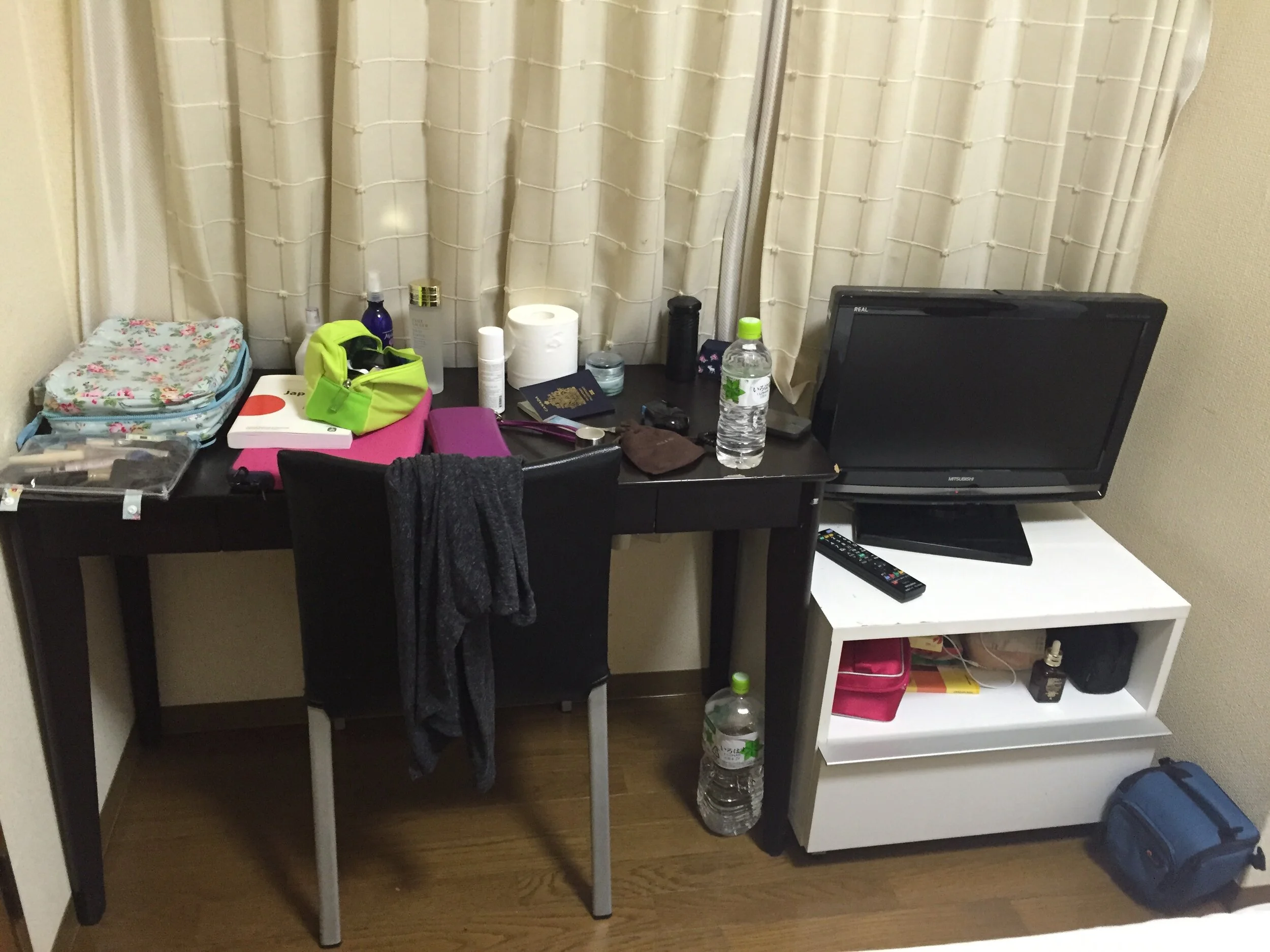  Look at that tiny desk and TV!  