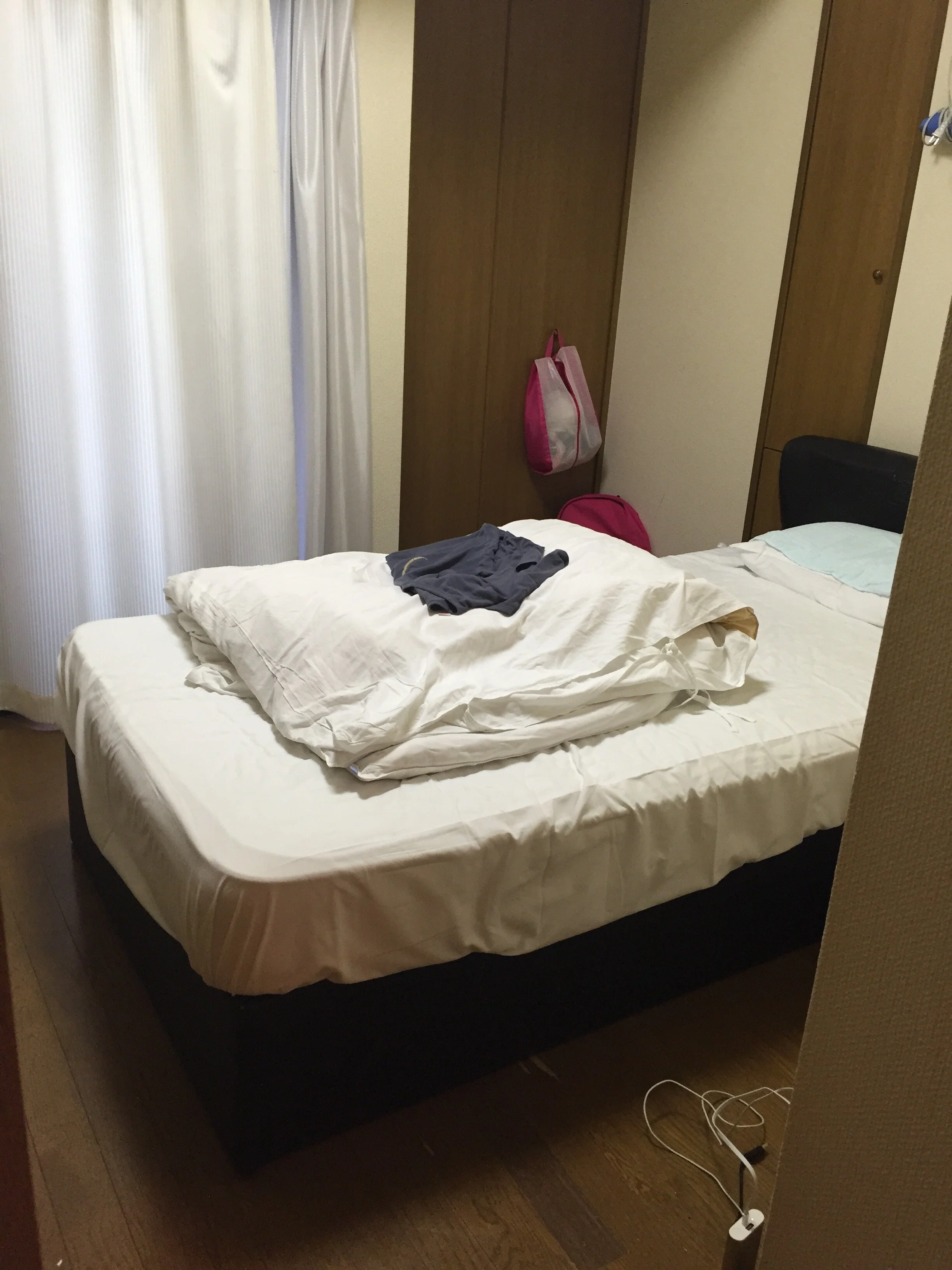  Bedroom comes with a closet and a balcony. 