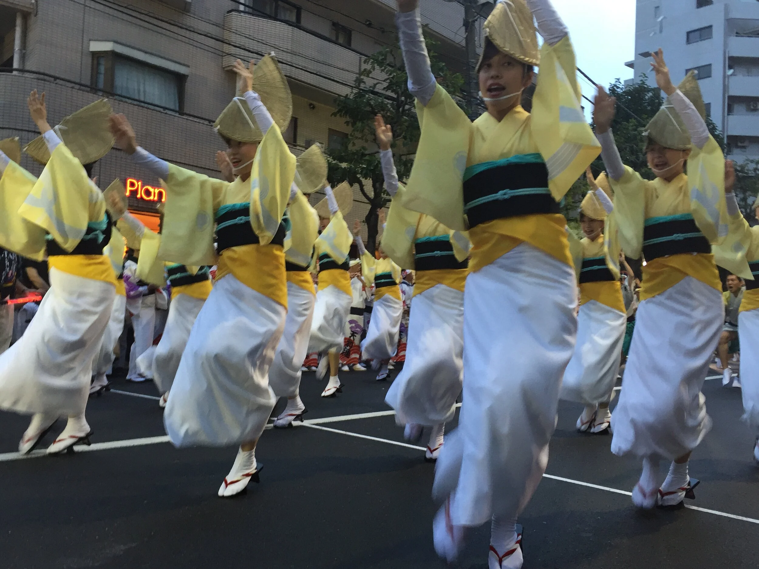  Bon Dance during Obon festivals in August.  @ Koenji Awa Odori 高円寺の阿波踊り, it is a parade of many groups of colorful and synchronized dancers. Another good example of perfection. 