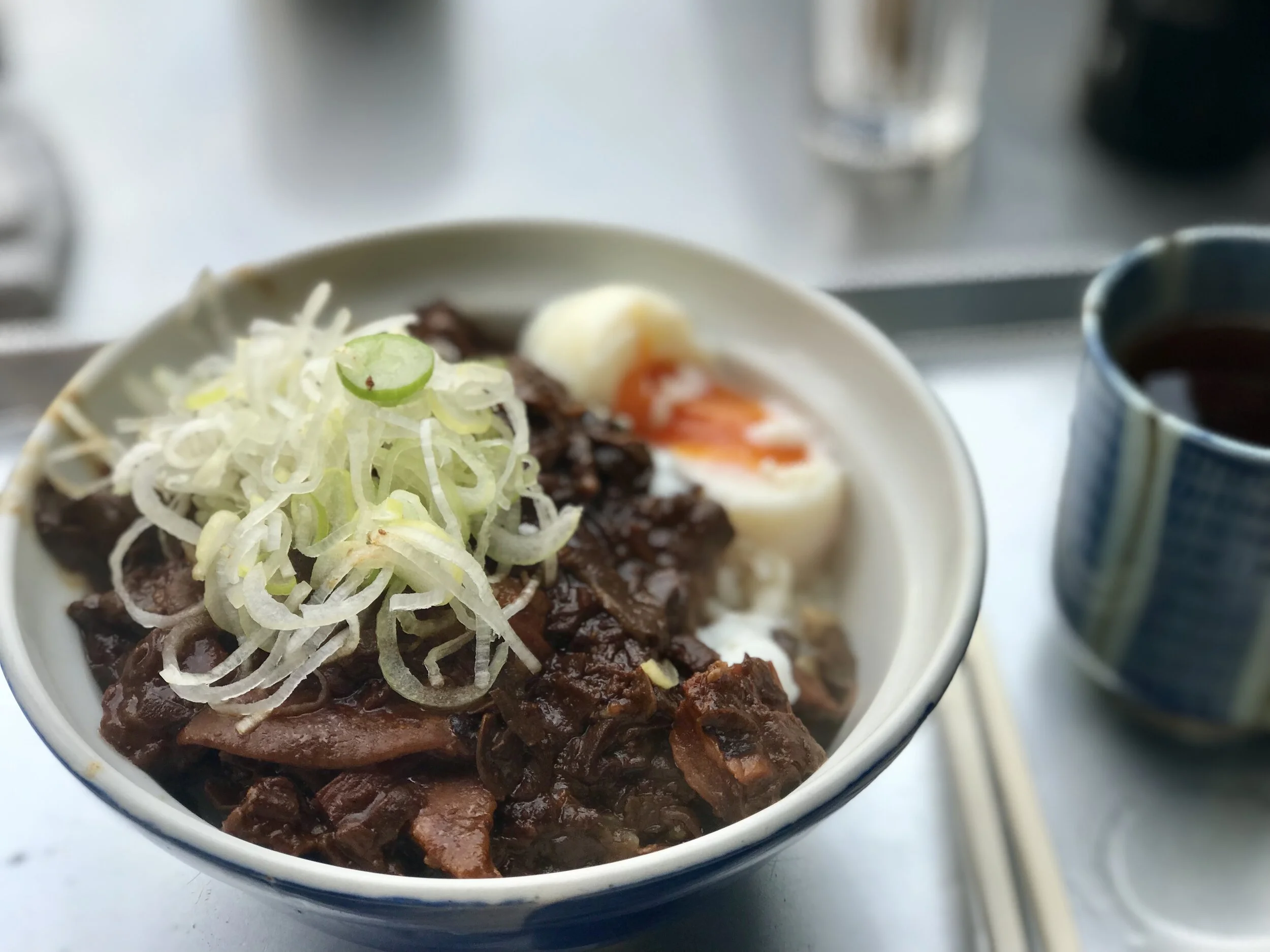  Horumon Bowl at Kitsuneya of Tsukiji market (before it moved). Horumon, negi, and onsen egg, all my favorite things! Highly recommended. 