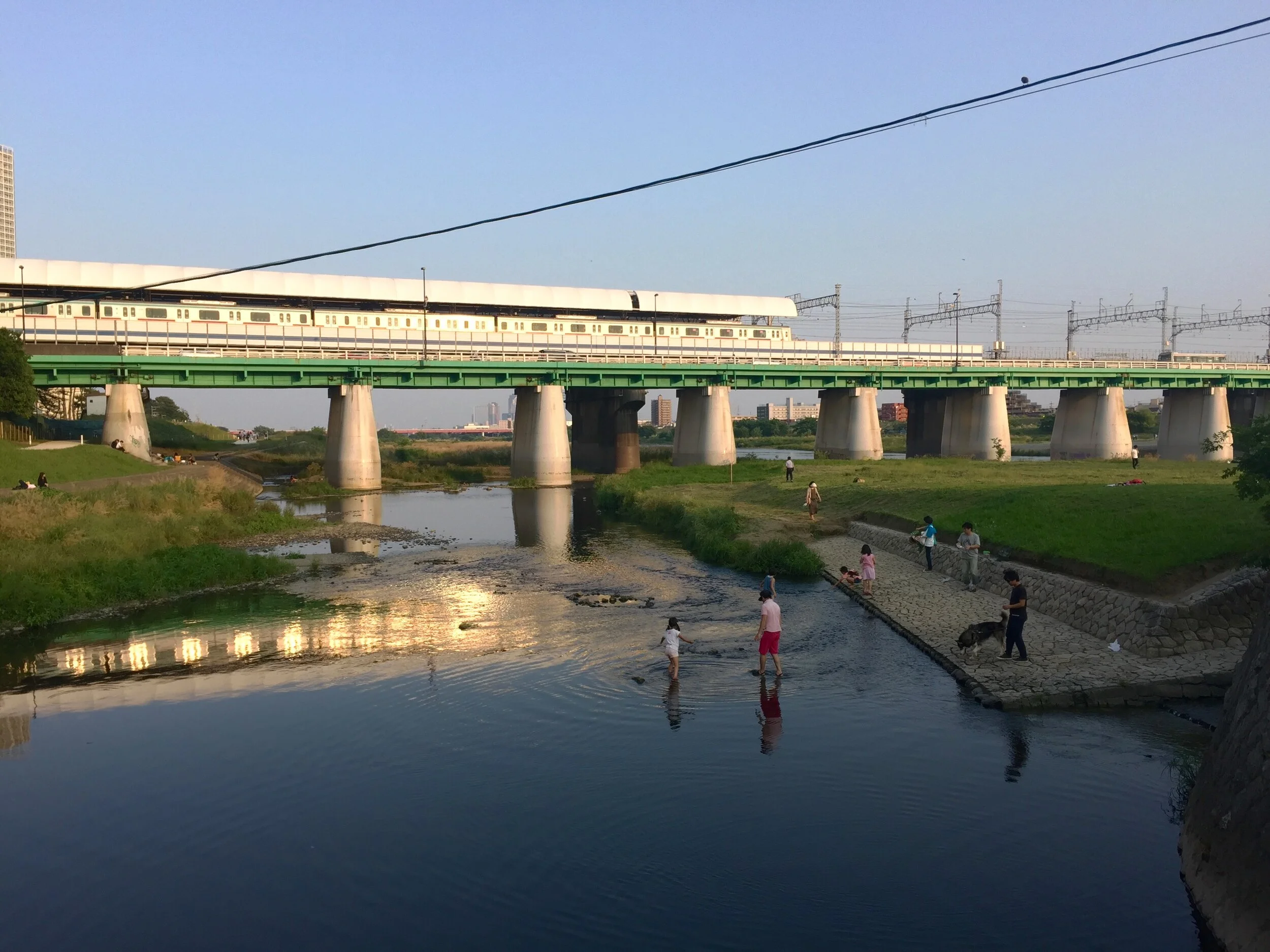  Kids playing on tama river. 