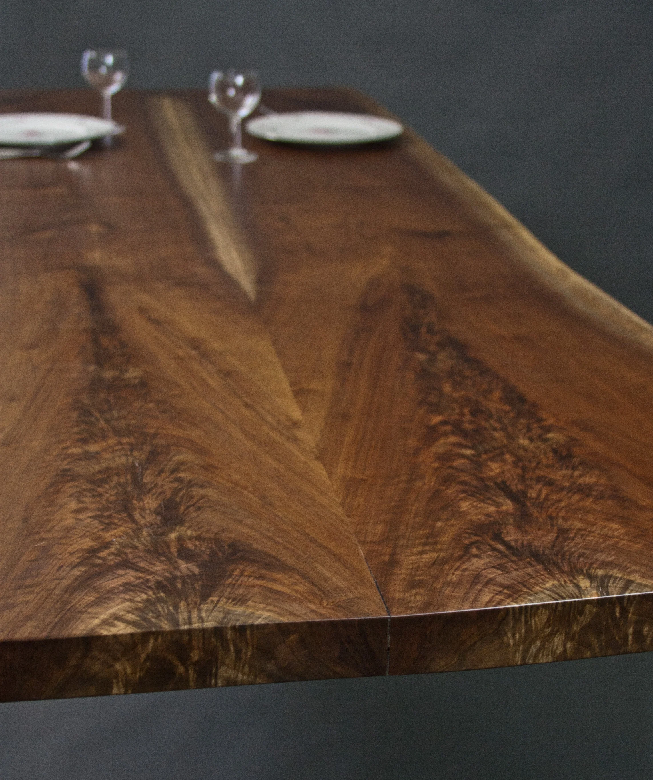 BOOKMATCHED WALNUT DINING TABLE
