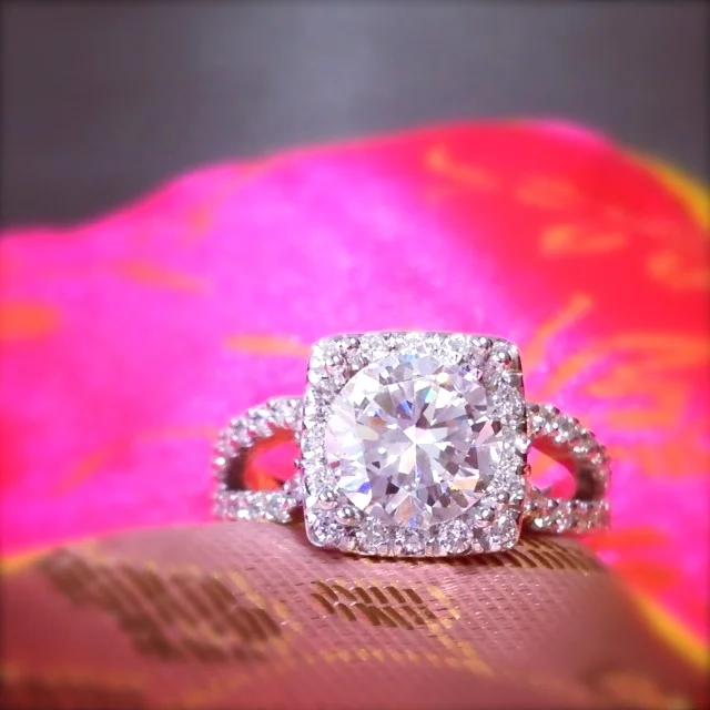  Custom, platinum, square halo ring&nbsp;with round brilliant cut center. 