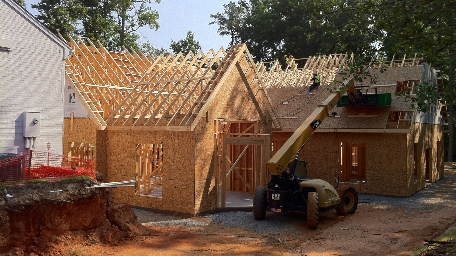 The Building Going Up Behind the House