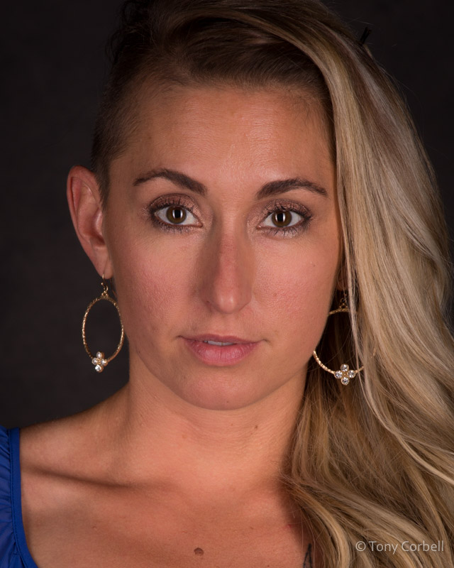 Two strip lights placed vertically. Highlights and shadows are under control and result in a great look to the face.
