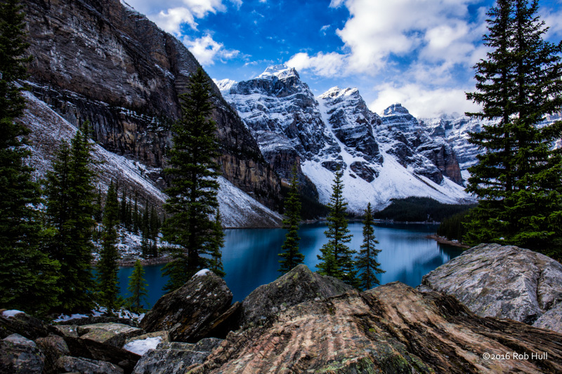 I used hyperfocal techniques to anchor the foreground with the rocks. Both the rocks and mountains are in focus giving the viewer a real sense of depth in this image. 