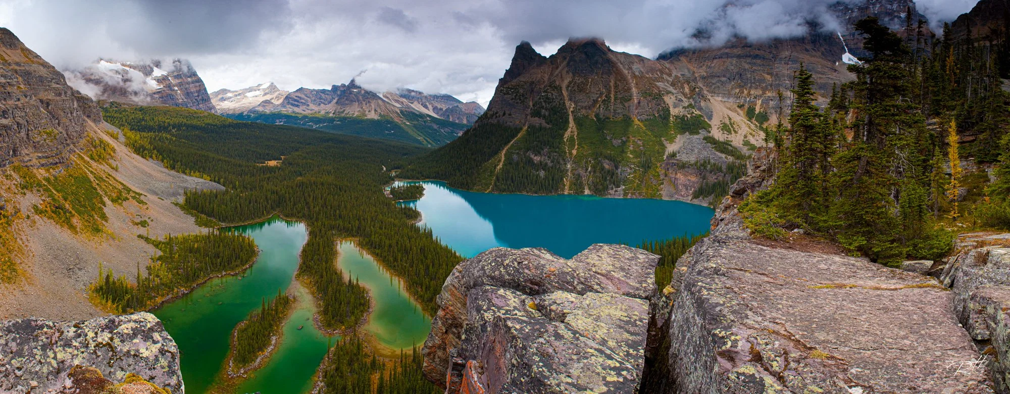  Glacier fed Lake Ohara in the Canadian Rockies take on an azure blue hue because of the fine glacial silt suspended in the water.  Mary Lake receives no glacial runoff so instead reflects a green cast. 