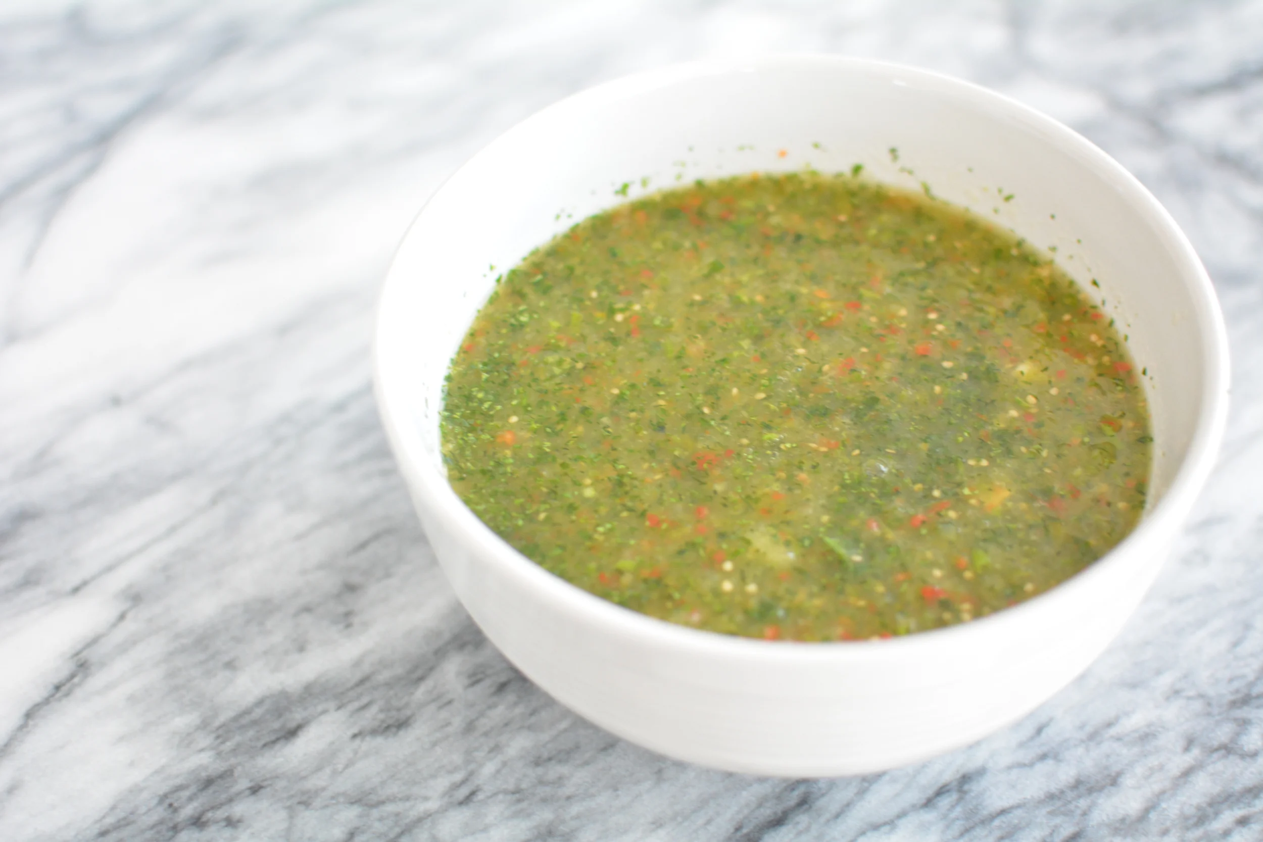 Ta-da! Finished product, salsa verde edition, with flecks from the red jalapeños. 