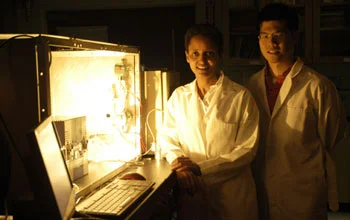 Sossina Haile and William Chueh next to the benchtop thermochemical reactor used to screen materials for implementation on the solar reactor. Image via CalTech