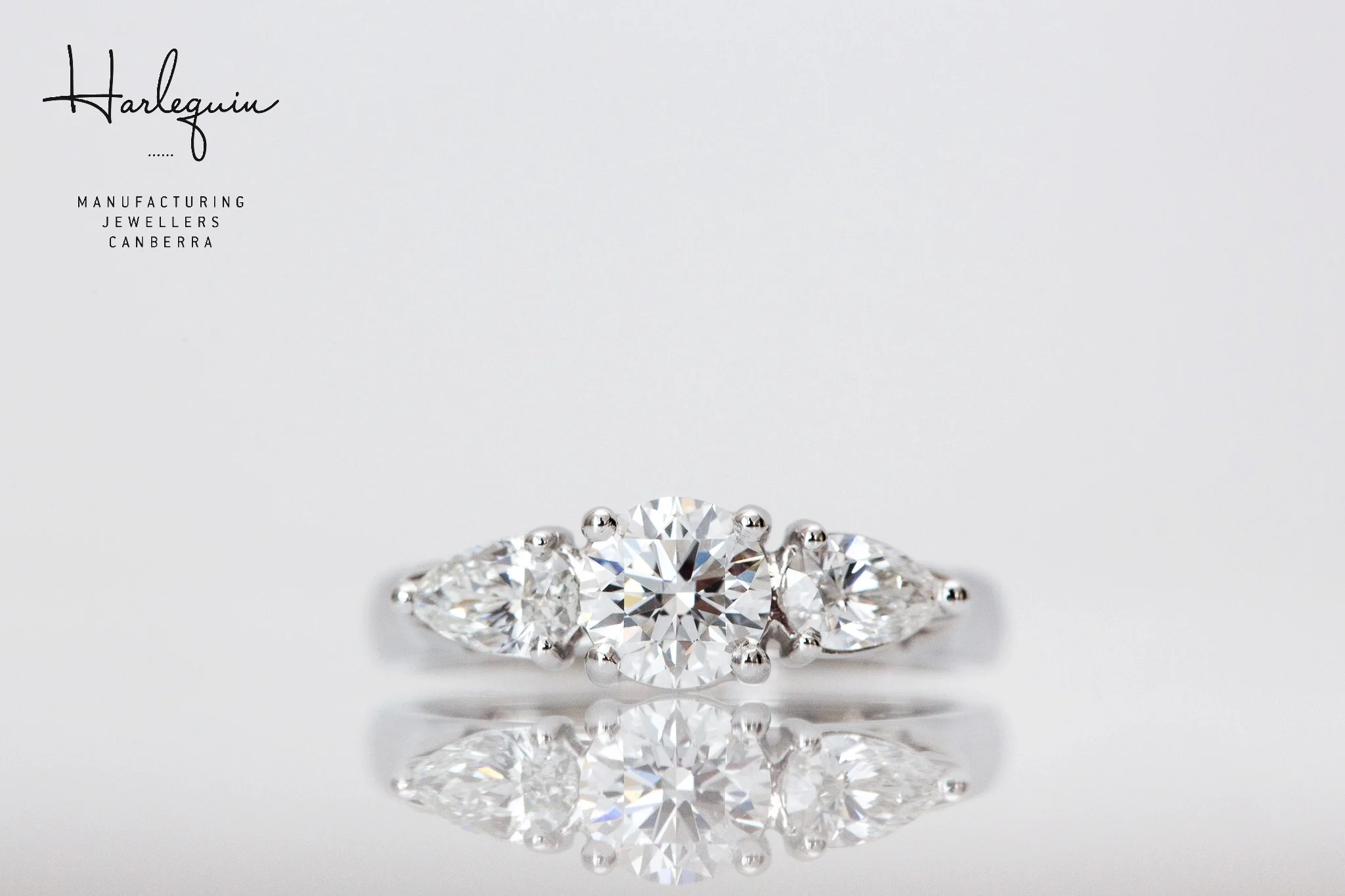 Three stone engagement ring