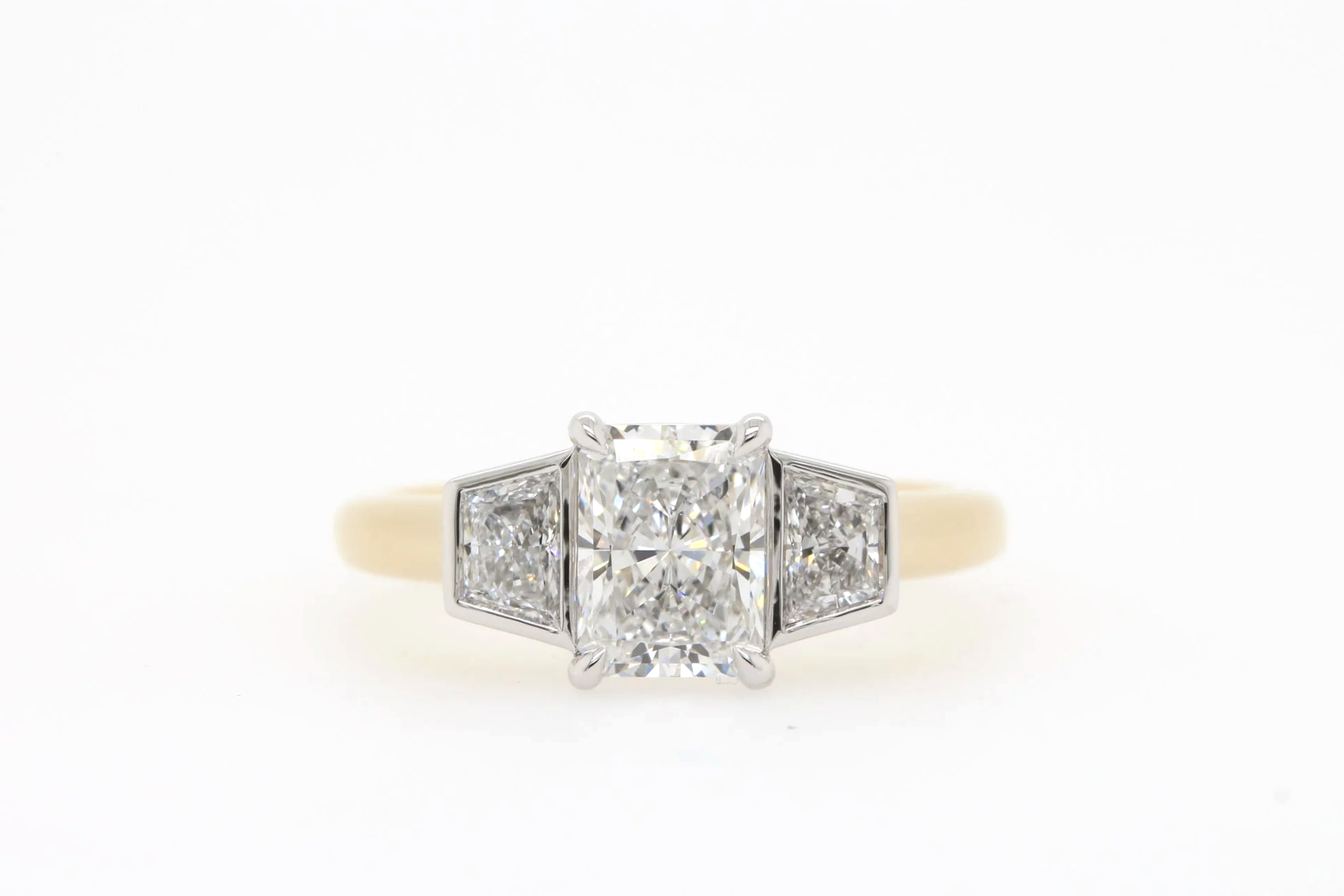 Custom Trilogy Engagement Ring with Radiant Cut and Trapezoid Diamonds