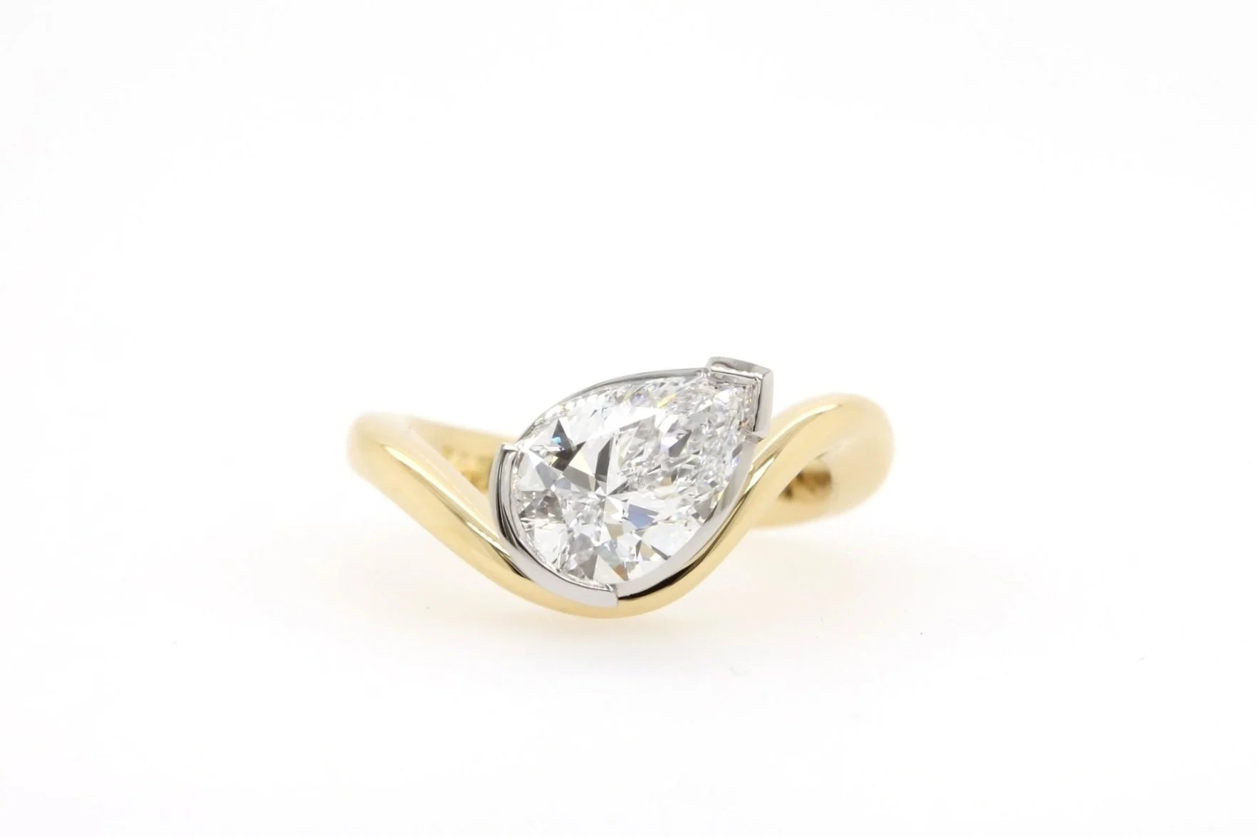 Curved Pear Diamond Solitaire Engagement Ring made in  Canberra