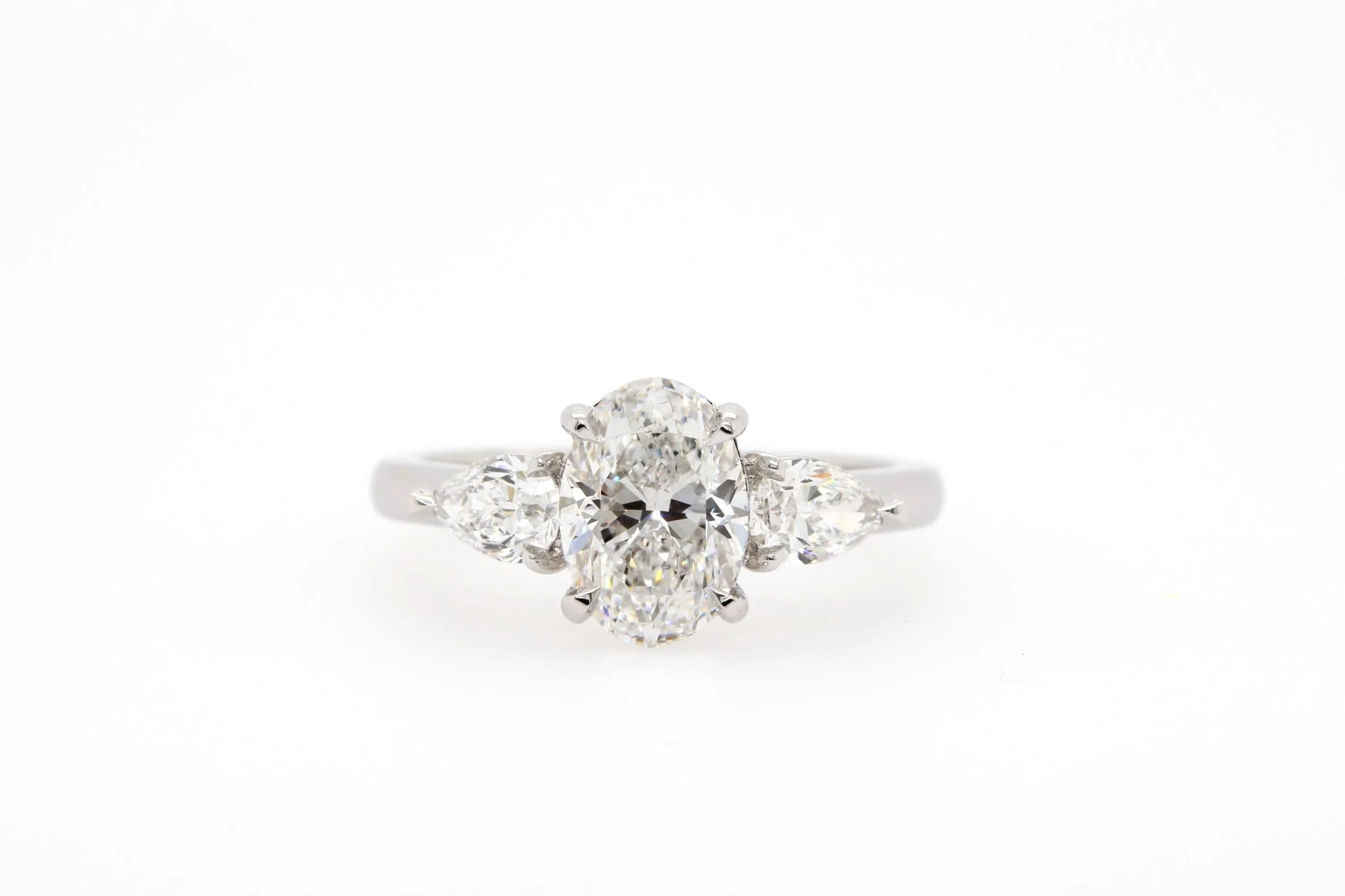 Oval and Pear Diamond Trilogy Ring