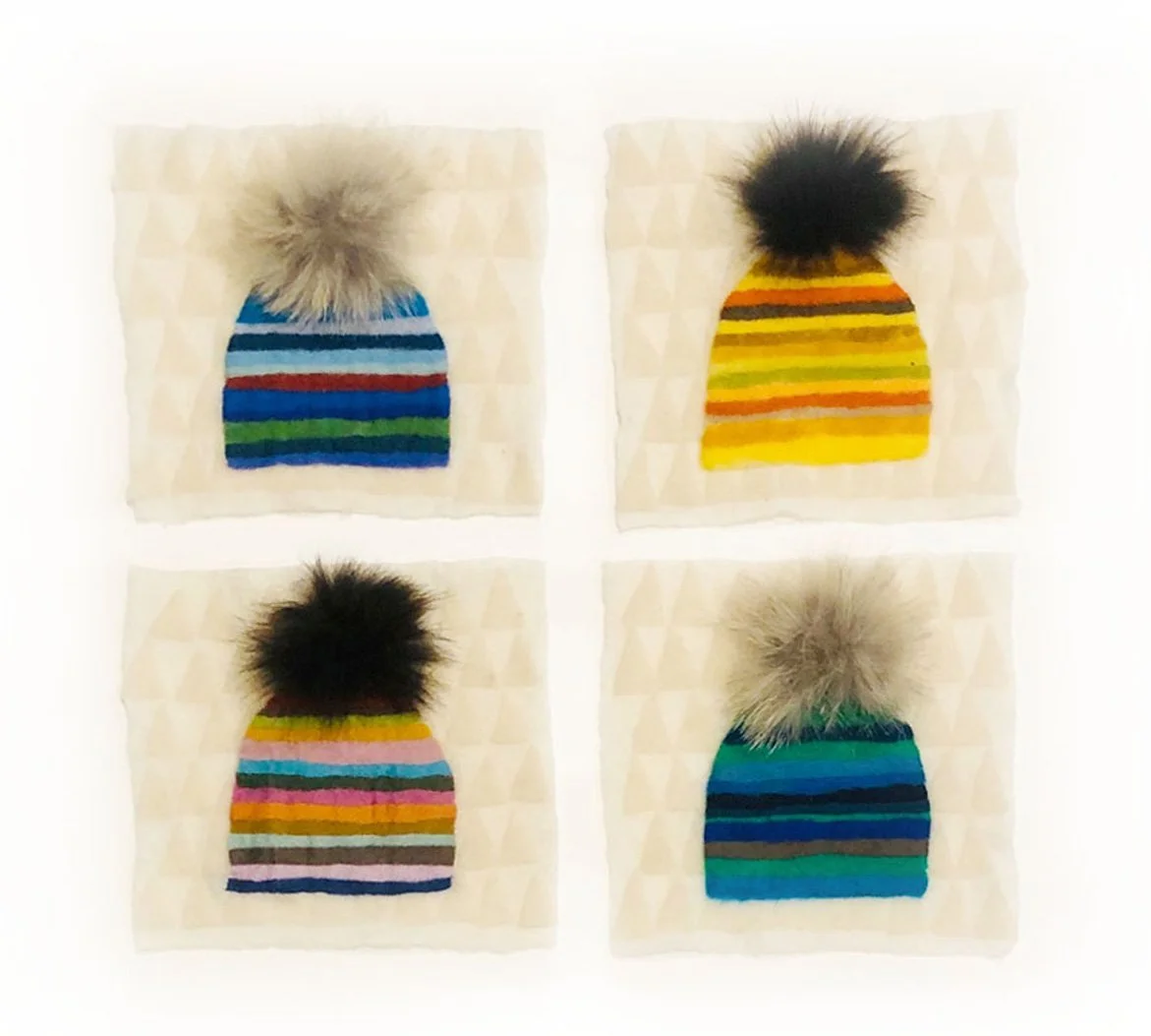Wee pompon hats.jpg