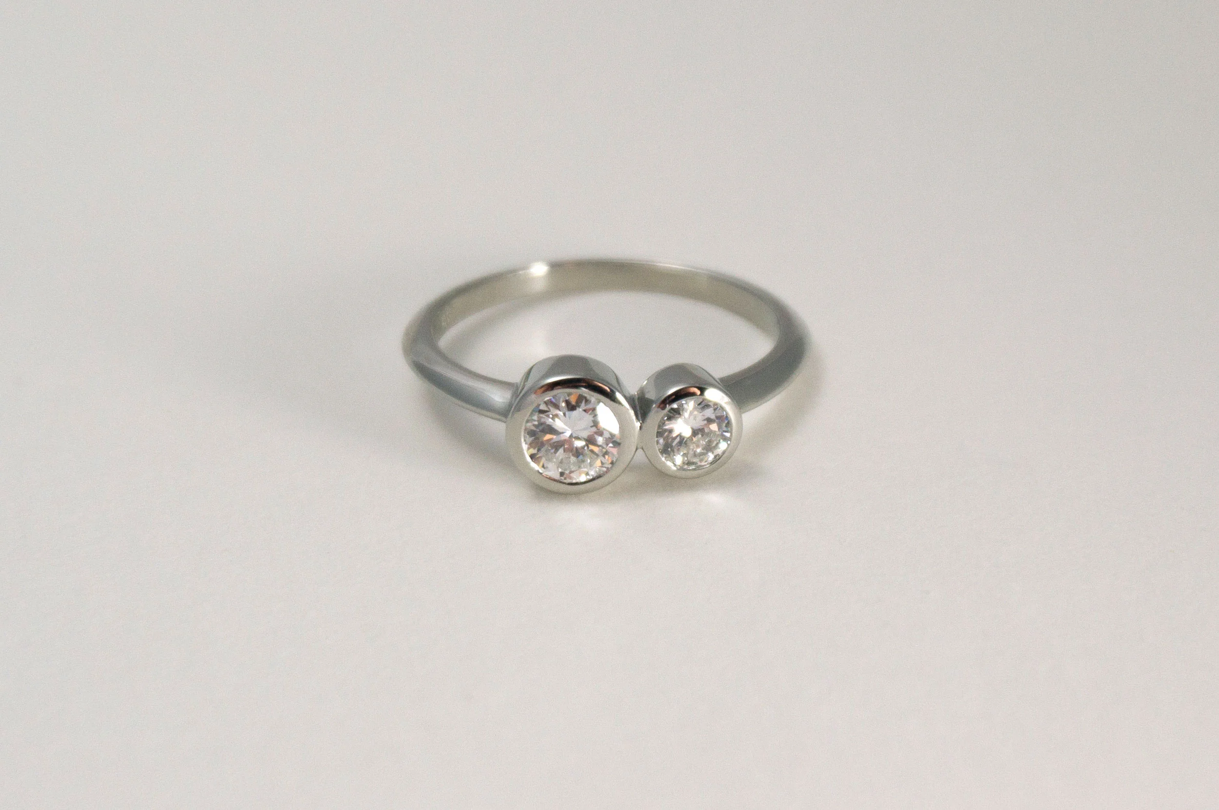 LORI Engagement Ring: bezel set heirloom diamonds, knife edge band, 14k white gold.