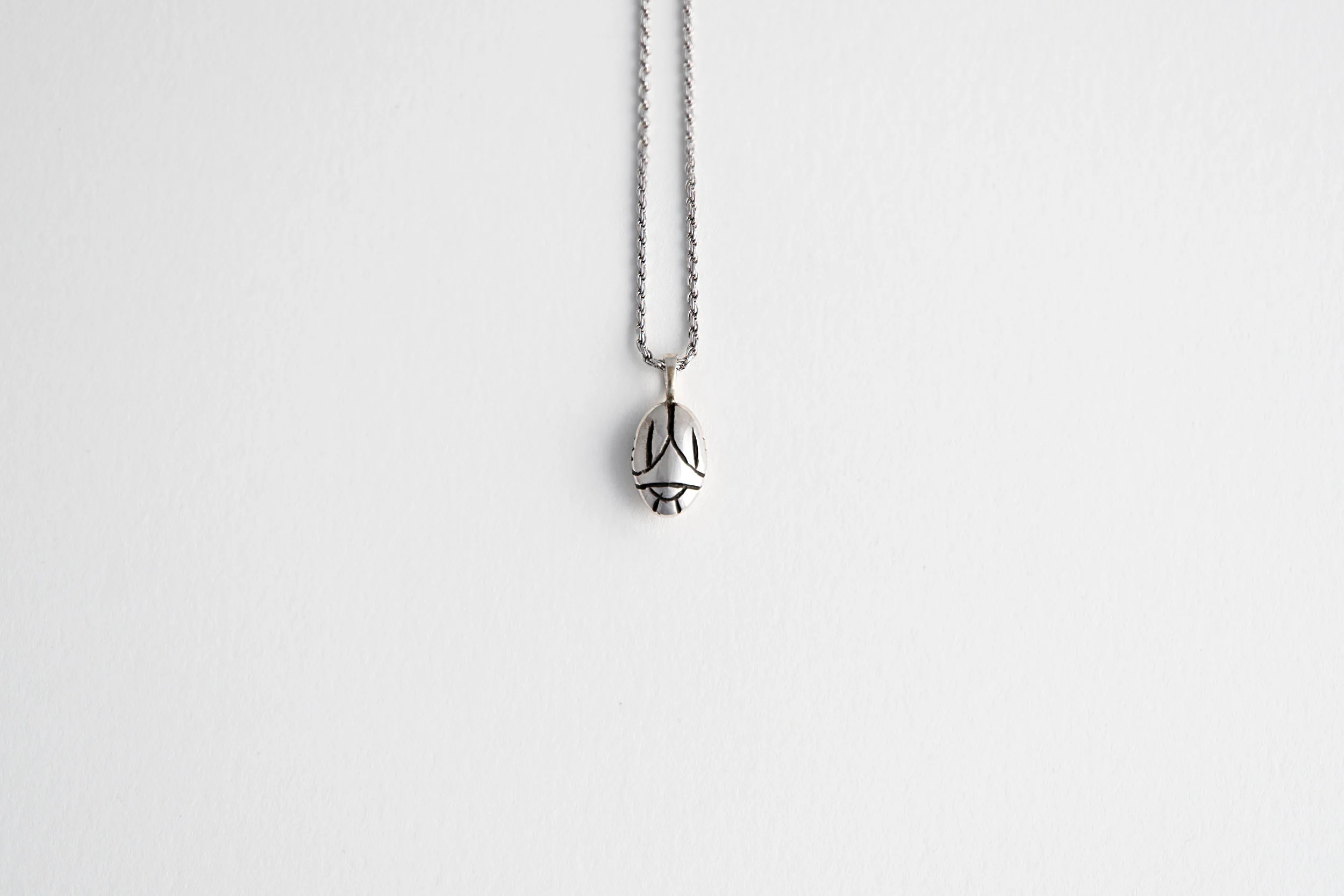mw-scarabNecklace-silver-reverse.jpg