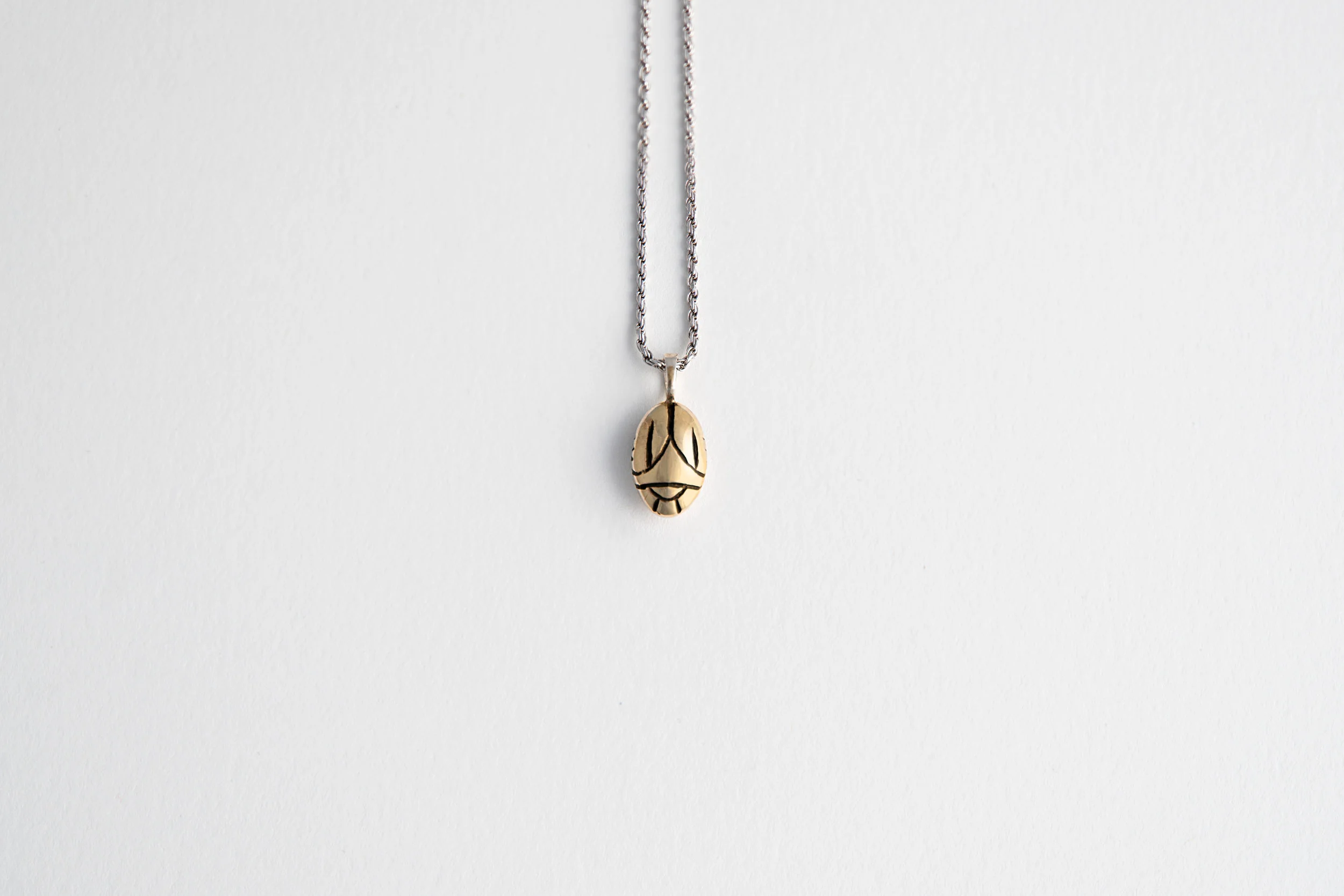 mw-scarabNecklace-gold-reverse.jpg