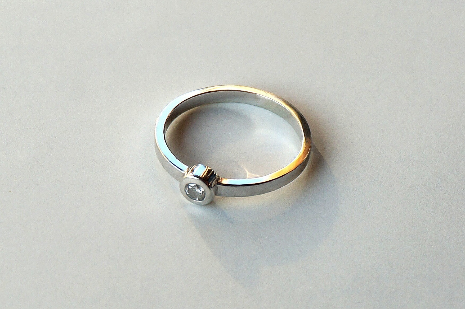 JILL Engagement Ring: ethically-sourced diamond, 18k white gold.