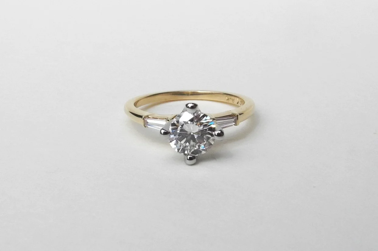 SHAN Engagement Ring: Heirloom diamond, 14k yellow gold band, 14k white gold setting and baguette diamond side stones.