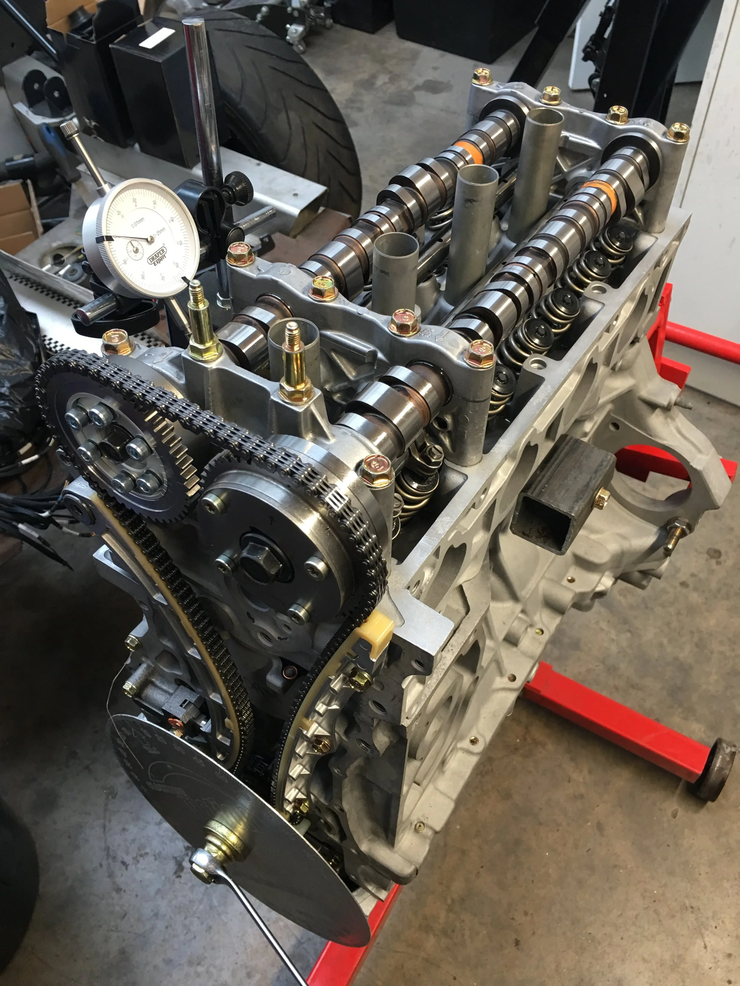 Setting cam timing...this is critical, 1mm of clearance only between the valve and piston with full advance.