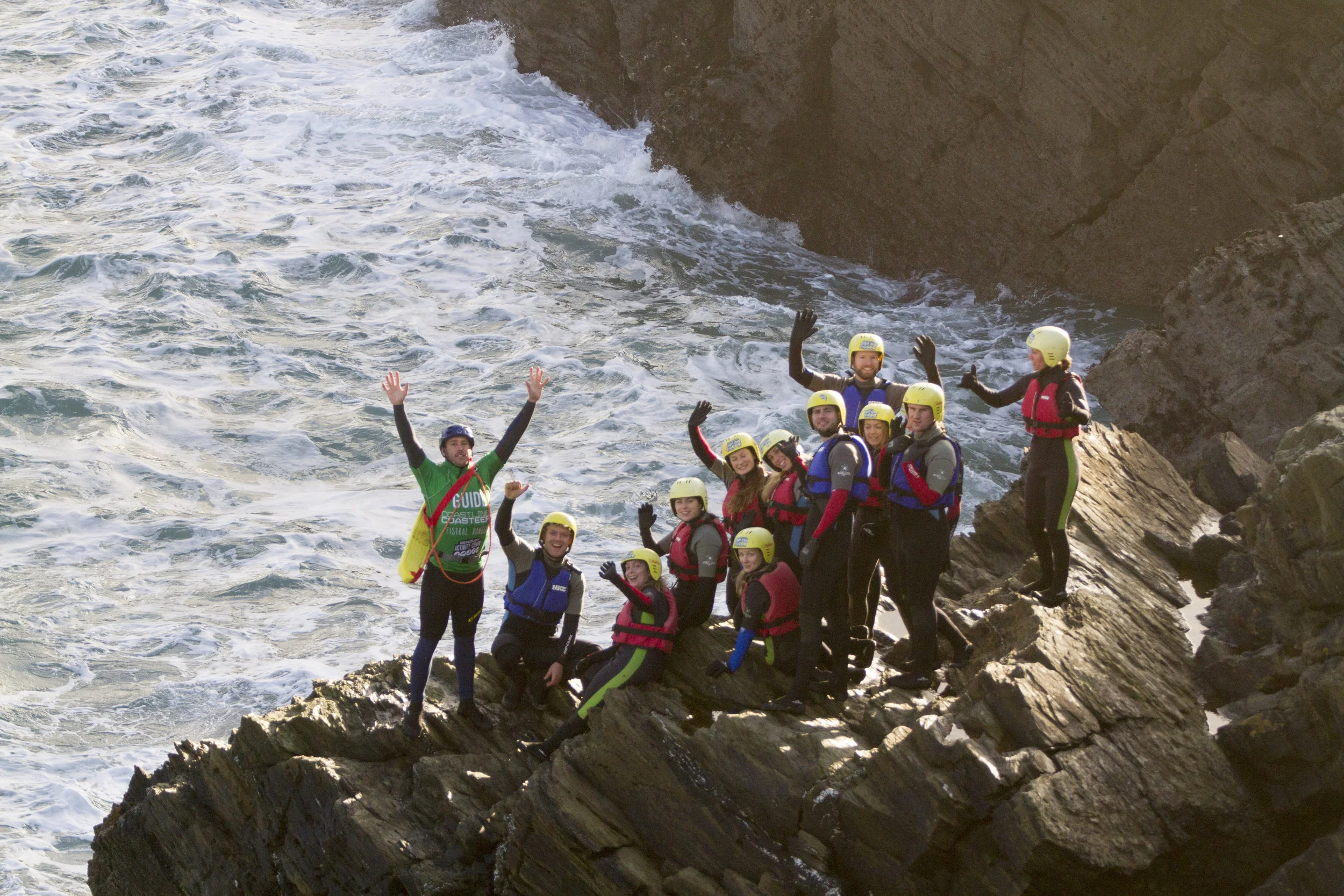 Nervous smiles before leaping into the bracing sea (Image: Warrick Murphy / Newquay Activity Centre)