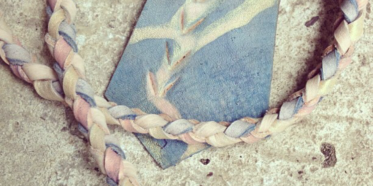 our vegetable tanned leather hand painted with indigo, alkanet and gold