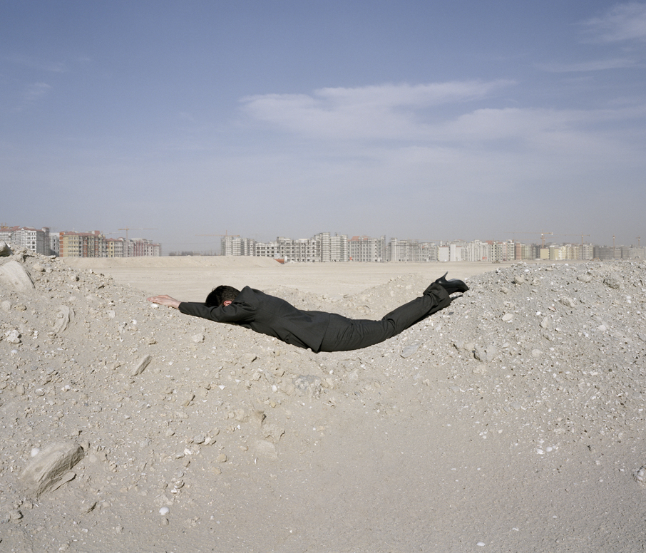 Body Techniques (after Parallel Stress , Dennis Oppenheim, 1970). Carey Young. 2007. Digital C-Type print, 55 7/8 x 48 inches