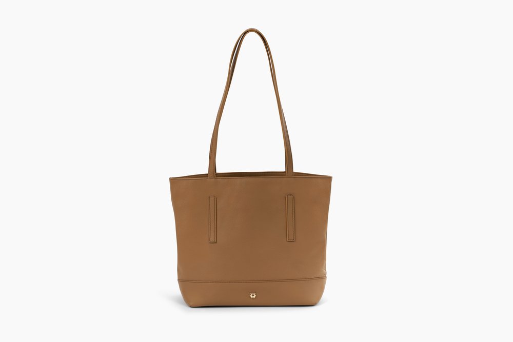 Your work bag, weekend bag, and on-the-go companion all in one. Meet our  Small Structured Tote in Cappuccino.
